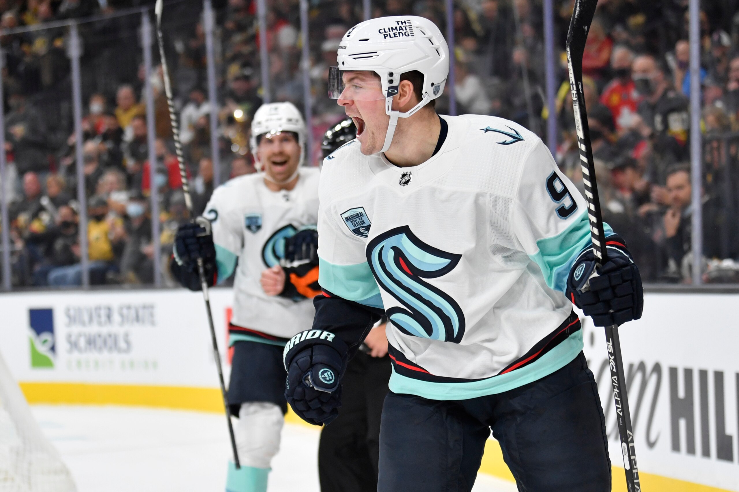 LAS VEGAS, NEVADA - OCTOBER 12: Ryan Donato #9 of the Seattle Kraken celebrates after scoring the first goal in team history during the second period of a game against the Vegas Golden Knights at T-Mobile Arena on October 12, 2021 in Las Vegas, Nevada. (Photo by Jeff Bottari/NHLI via Getty Images) LAS VEGAS, NEVADA - OCTOBER 12: Ryan Donato #9 of the Seattle Kraken celebrates after scoring the first goal in team history during the second period of a game against the Vegas Golden Knights at T-Mobile Arena on October 12, 2021 in Las Vegas, Nevada. (Photo by Jeff Bottari/NHLI via Getty Images)