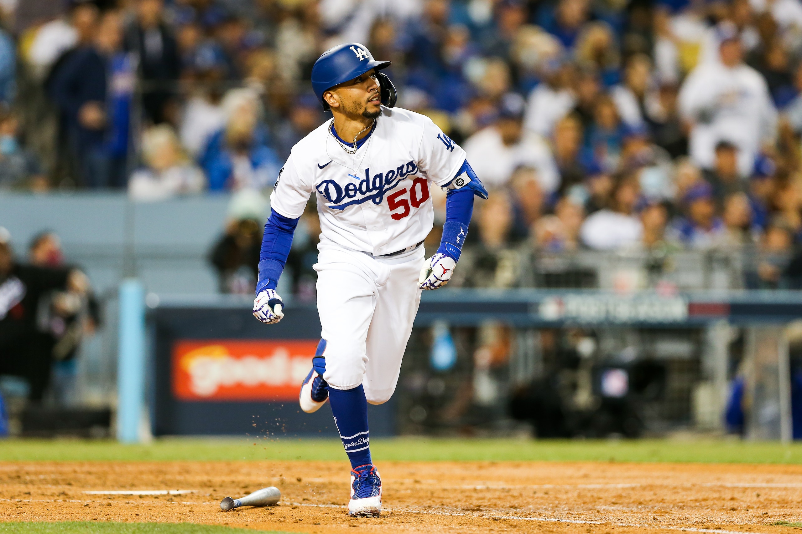 LOS ANGELES, CA - OCTOBER 12: Mookie Betts #50 of the Los Angeles Dodgers hits a two run home run in the fourth inning during Game 4 of the NLDS between the San Francisco Giants and the Los Angeles Dodgers at Dodgers Stadium on Tuesday, October 12, 2021 in Los Angeles, California. (Photo by Rob Leiter/MLB Photos via Getty Images)