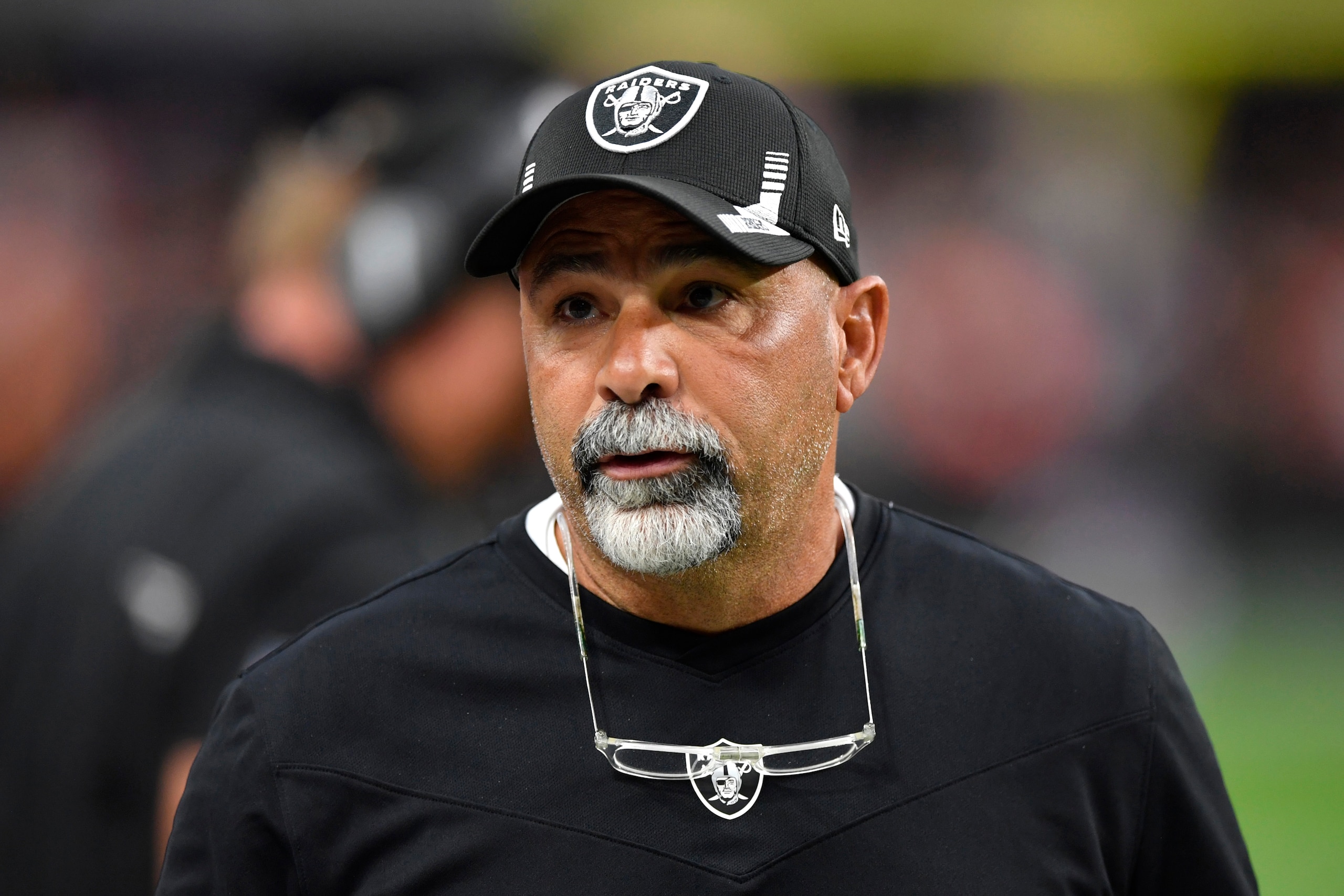 LAS VEGAS, NEVADA - OCTOBER 10:  Assistant head coach/special teams coordinator Rich Bisaccia looks on during the second half of a game against the Chicago Bears at Allegiant Stadium on October 10, 2021 in Las Vegas, Nevada. The Bears defeated the Raiders 20-9. (Photo by Chris Unger/Getty Images)