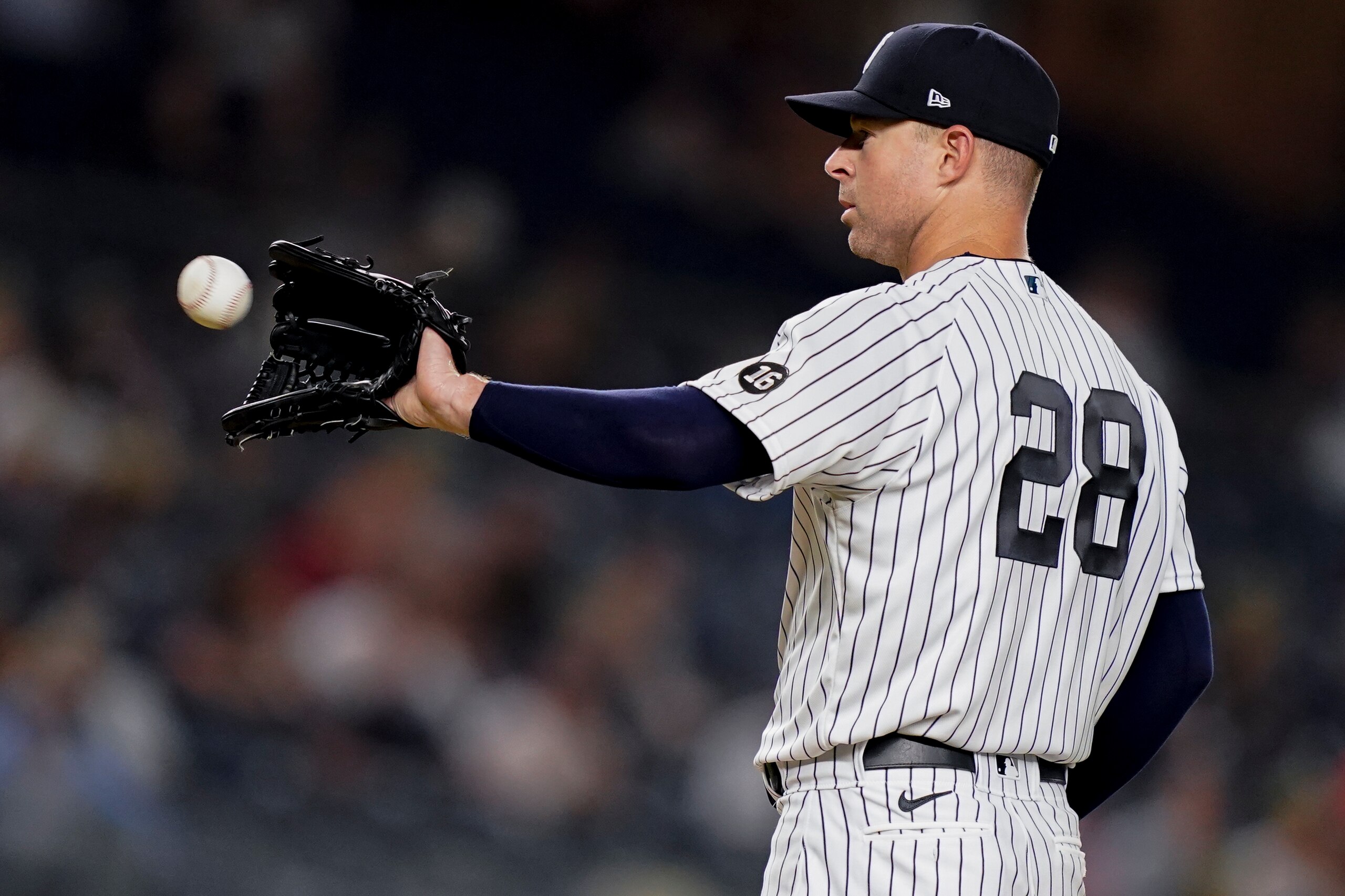 New York Yankees starting pitcher Corey Kluber receives the ball in the second inning of a baseball game against the Cleveland Indians, Friday, Sept. 17, 2021, in New York. (AP Photo/John Minchillo) New York Yankees starting pitcher Corey Kluber receives the ball in the second inning of a baseball game against the Cleveland Indians, Friday, Sept. 17, 2021, in New York. (AP Photo/John Minchillo)
