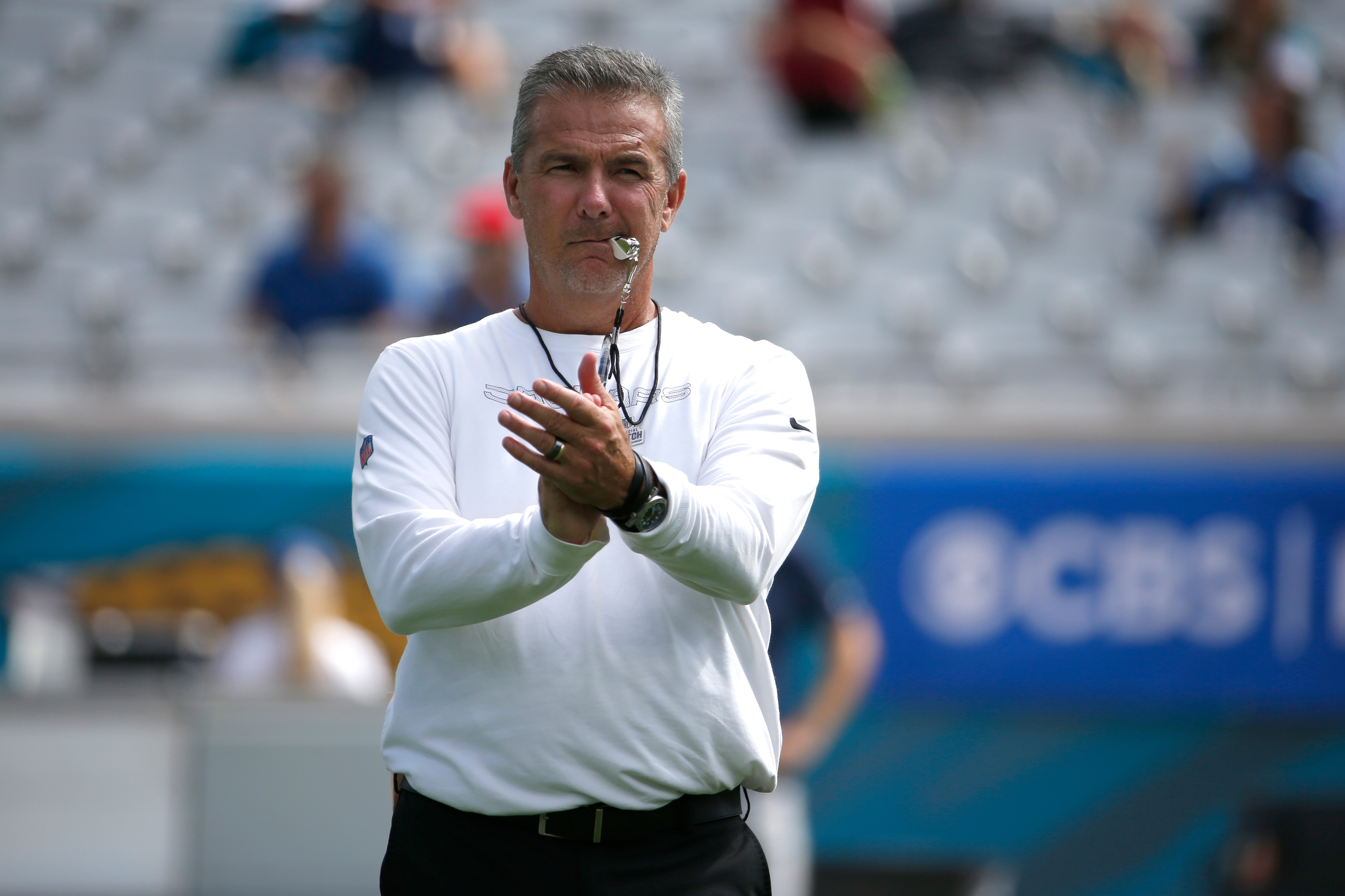 Jacksonville Jaguars head coach Urban Meyer watches players warm up before an NFL football game against the Tennessee Titans, Sunday, Oct. 10, 2021, in Jacksonville, Fla. (AP Photo/Stephen B. Morton)