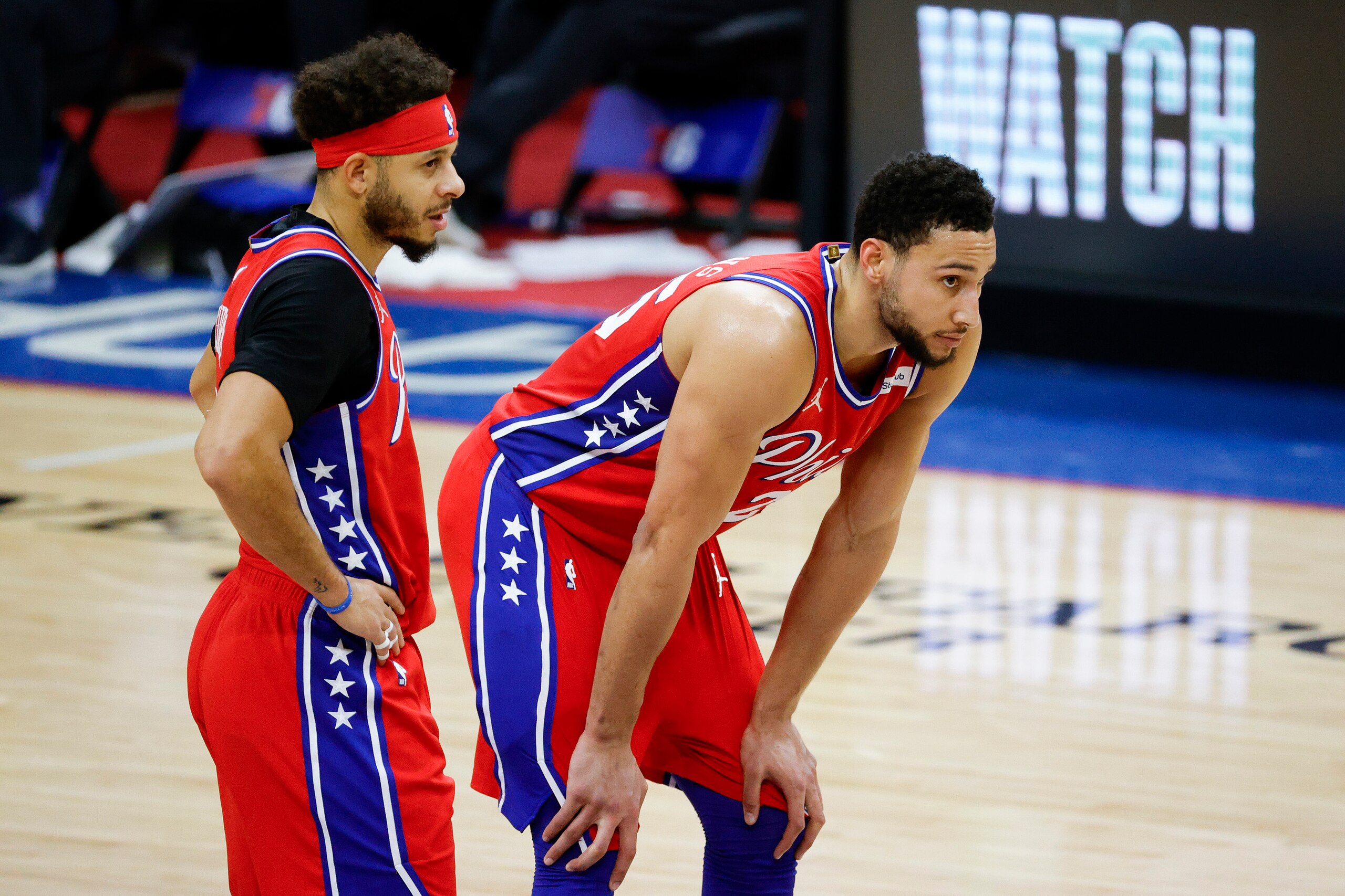 PHILADELPHIA, PENNSYLVANIA - FEBRUARY 25: Seth Curry #31 and Ben Simmons #25 of the Philadelphia 76ers look on against the Dallas Mavericks at Wells Fargo Center on February 25, 2021 in Philadelphia, Pennsylvania. NOTE TO USER: User expressly acknowledges and agrees that, by downloading and or using this photograph, User is consenting to the terms and conditions of the Getty Images License Agreement. (Photo by Tim Nwachukwu/Getty Images) PHILADELPHIA, PENNSYLVANIA - FEBRUARY 25: Seth Curry #31 and Ben Simmons #25 of the Philadelphia 76ers look on against the Dallas Mavericks at Wells Fargo Center on February 25, 2021 in Philadelphia, Pennsylvania. NOTE TO USER: User expressly acknowledges and agrees that, by downloading and or using this photograph, User is consenting to the terms and conditions of the Getty Images License Agreement. (Photo by Tim Nwachukwu/Getty Images)