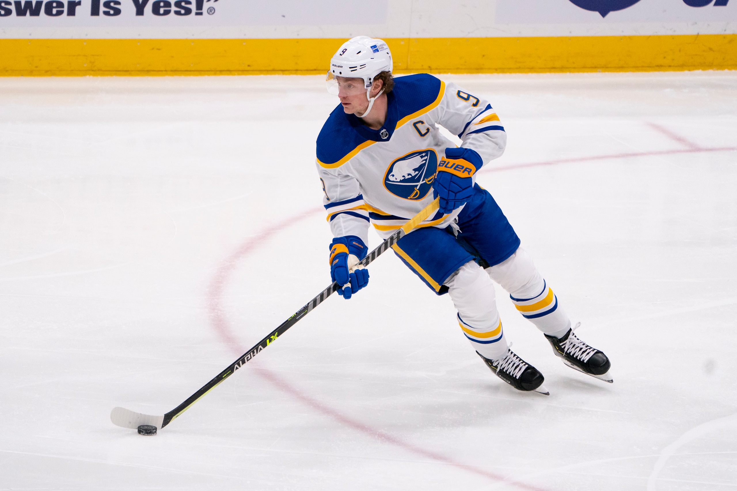 UNIONDALE, NY - MARCH 07: Buffalo Sabres Center Jack Eichel (9) skates with the puck during the first period of the National Hockey League game between the Buffalo Sabres and the New York Islanders on March 7, 2021, at the Nassau Veterans Memorial Coliseum in Uniondale, NY. (Photo by Gregory Fisher/Icon Sportswire via Getty Images)
