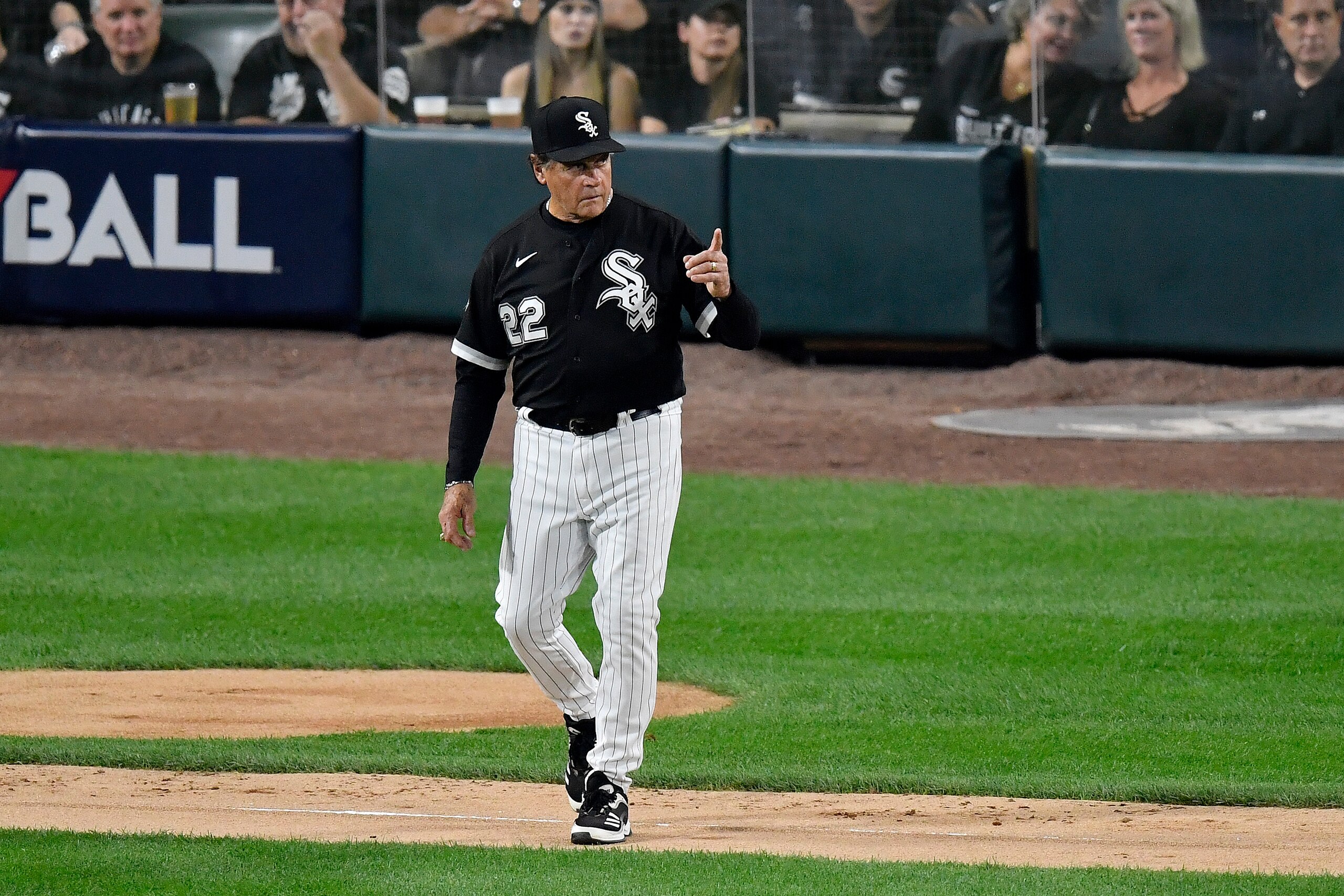 CHICAGO, ILLINOIS - OCTOBER 10: Manager Tony La Russa #22 of the Chicago White Sox walks on the field for a pitching change in the second inning during game 3 of the American League Division Series against the Houston Astros at Guaranteed Rate Field on October 10, 2021 in Chicago, Illinois. (Photo by Quinn Harris/Getty Images)