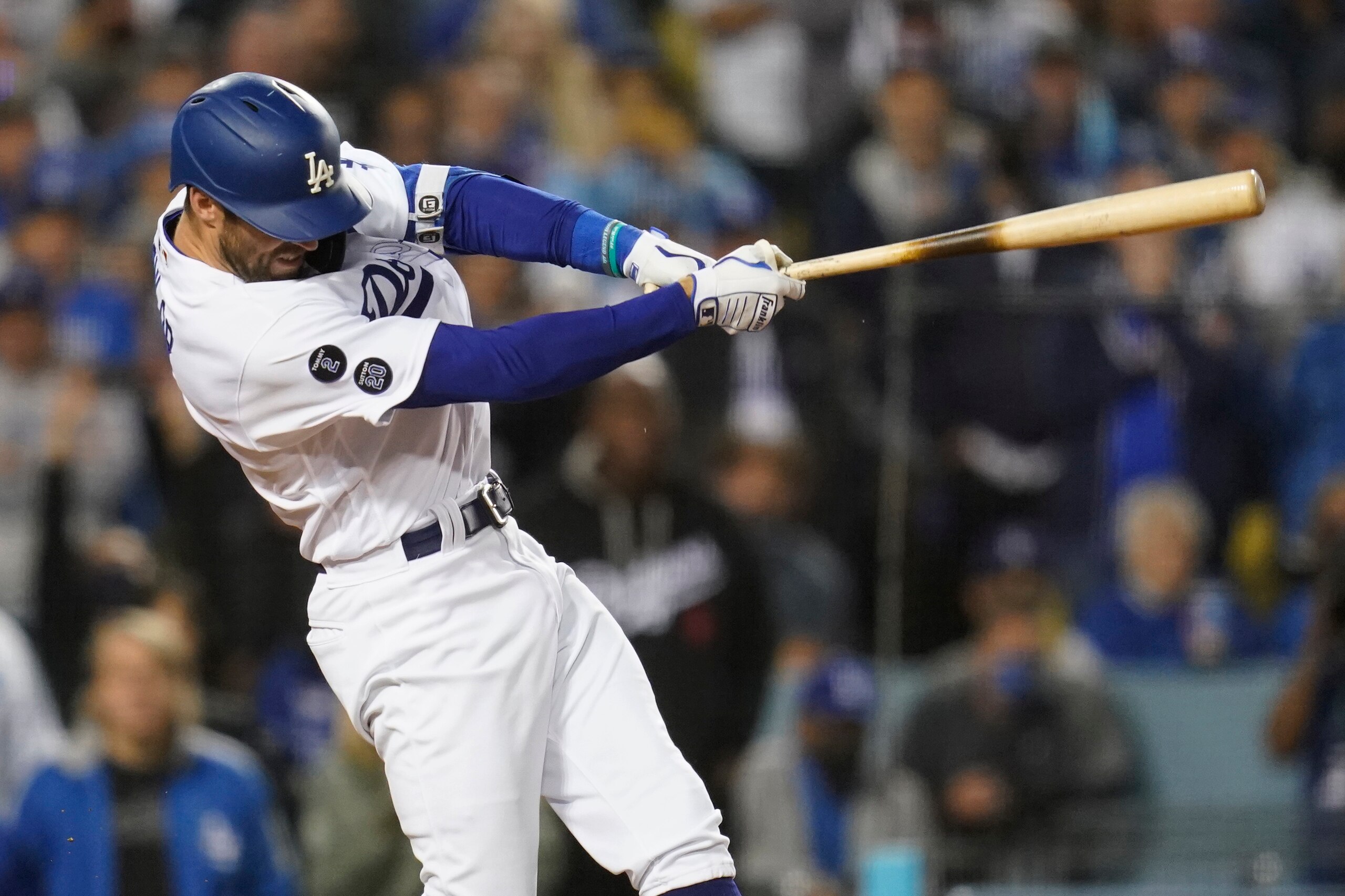 Los Angeles Dodgers' Chris Taylor flies out to end the third inning, stranding three runners during Game 4 of the baseball team's National League Division Series against the San Francisco Giants, Tuesday, Oct. 12, 2021, in Los Angeles. (AP Photo/Ashley Landis)