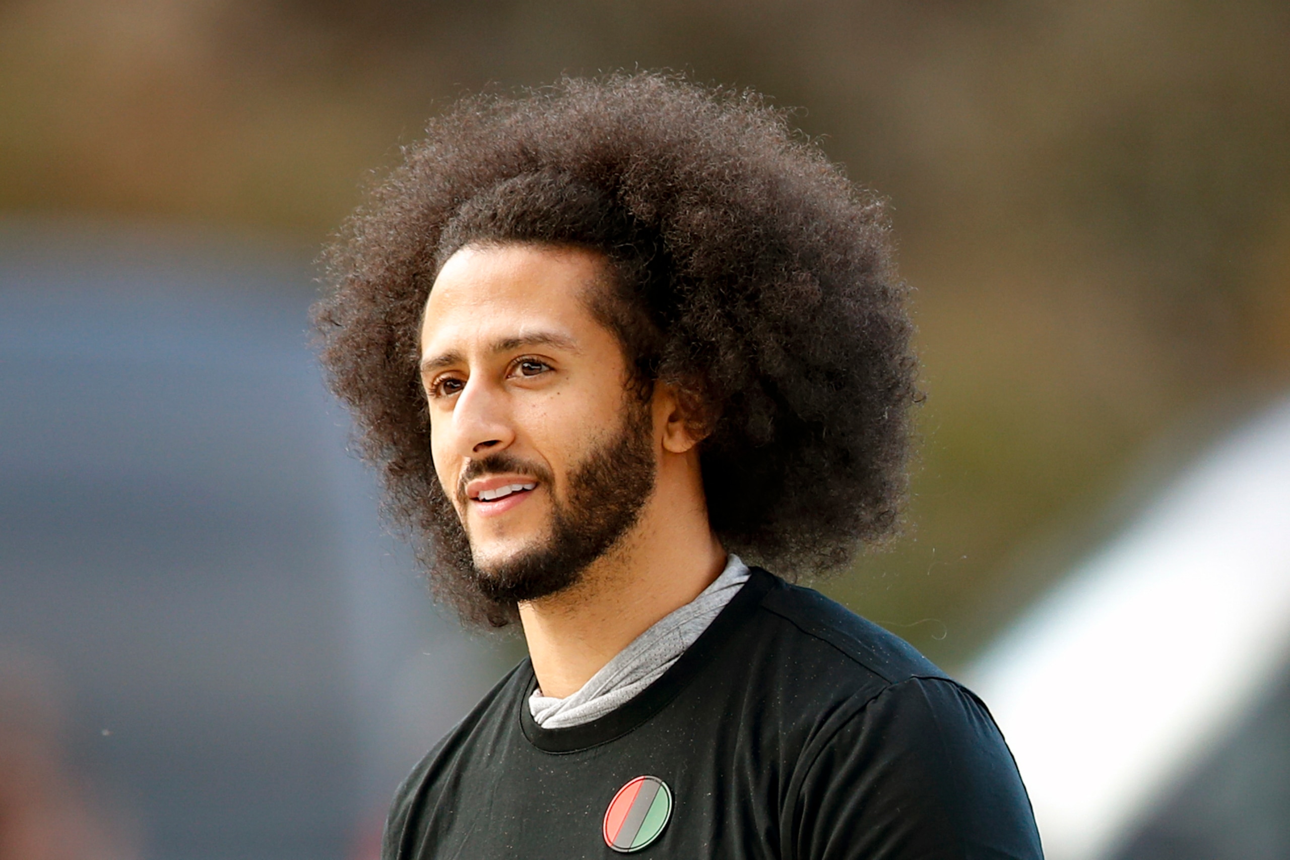 FILE - In this Nov. 16, 2019, file photo, free agent quarterback Colin Kaepernick arrives for a workout for NFL football scouts and media in Riverdale, Ga. The U.S. Navy is investigating a video in which military work dogs attacked a "Colin Kaepernick stand-in" during a demonstration at a Navy Seal Museum fundraiser. The event happened last year at the museum in Fort Pierce, Florida, but the video resurfaced over the weekend. On Sunday, the U.S. Navy said in a statement that it appears no active duty personnel were involved. (AP Photo/Todd Kirkland, File) FILE - In this Nov. 16, 2019, file photo, free agent quarterback Colin Kaepernick arrives for a workout for NFL football scouts and media in Riverdale, Ga. The U.S. Navy is investigating a video in which military work dogs attacked a "Colin Kaepernick stand-in" during a demonstration at a Navy Seal Museum fundraiser. The event happened last year at the museum in Fort Pierce, Florida, but the video resurfaced over the weekend. On Sunday, the U.S. Navy said in a statement that it appears no active duty personnel were involved. (AP Photo/Todd Kirkland, File)