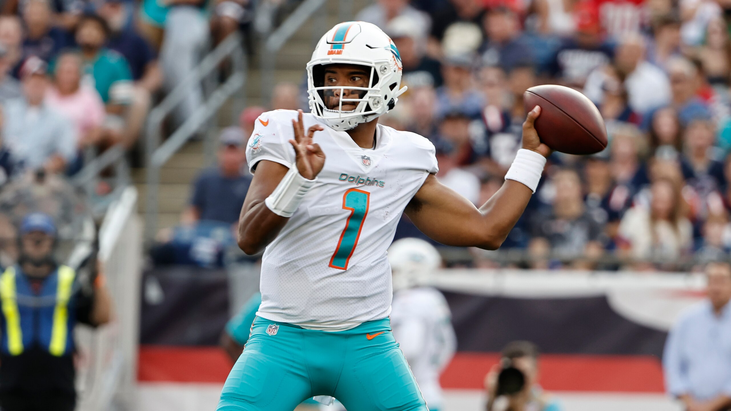 Miami Dolphins quarterback Tua Tagovailoa (1) throws during the first half of an NFL football game, Sunday, Sept. 12, 2021, in Foxborough, Mass. (AP Photo/Winslow Townson)