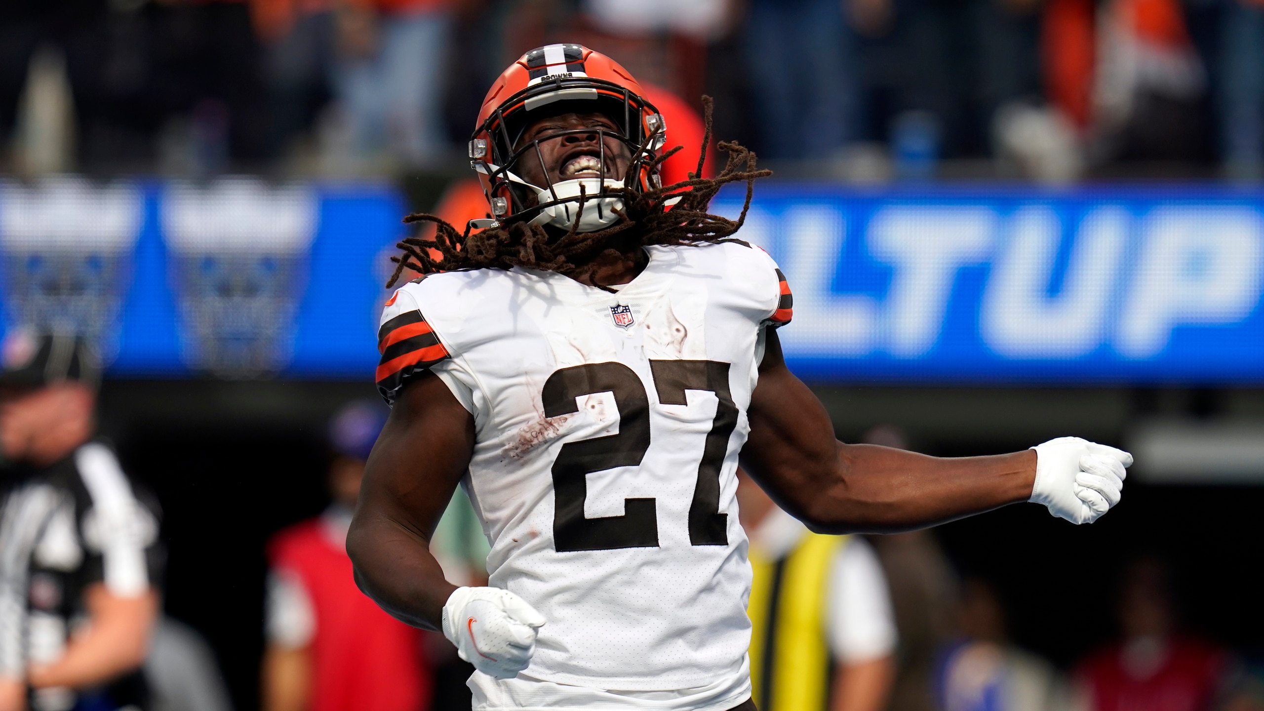 Cleveland Browns running back Kareem Hunt reacts after scoring during the first half of an NFL football game against the Los Angeles Chargers Monday, Oct. 11, 2021, in Inglewood, Calif. (AP Photo/Gregory Bull )