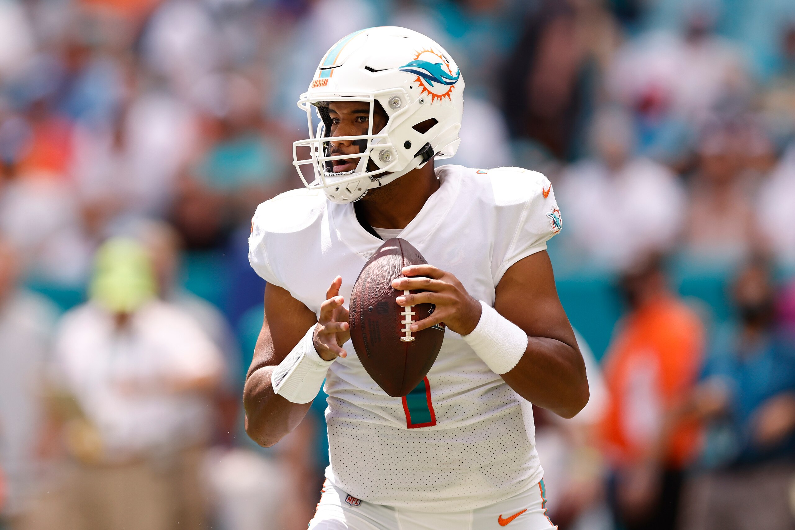 MIAMI GARDENS, FLORIDA - SEPTEMBER 19: Tua Tagovailoa #1 of the Miami Dolphins looks to pass against the Buffalo Bills during the first quarter at Hard Rock Stadium on September 19, 2021 in Miami Gardens, Florida. (Photo by Michael Reaves/Getty Images)