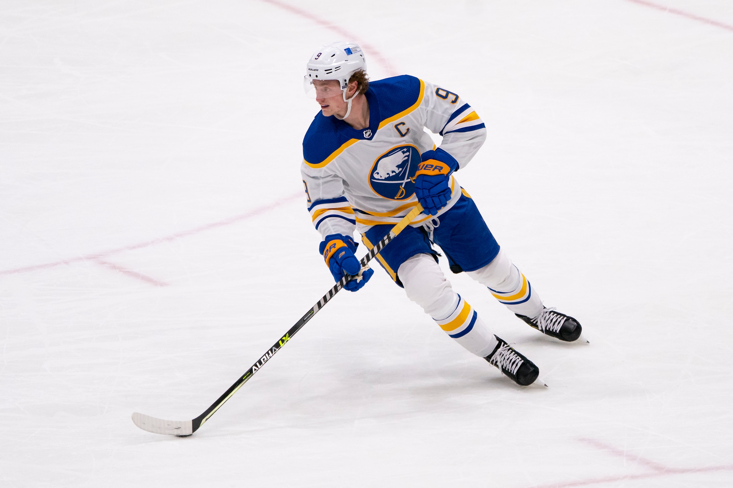 UNIONDALE, NY - MARCH 07: Buffalo Sabres Center Jack Eichel (9) skates with the puck during the third period of the National Hockey League game between the Buffalo Sabres and the New York Islanders on March 7, 2021, at the Nassau Veterans Memorial Coliseum in Uniondale, NY. (Photo by Gregory Fisher/Icon Sportswire via Getty Images) UNIONDALE, NY - MARCH 07: Buffalo Sabres Center Jack Eichel (9) skates with the puck during the third period of the National Hockey League game between the Buffalo Sabres and the New York Islanders on March 7, 2021, at the Nassau Veterans Memorial Coliseum in Uniondale, NY. (Photo by Gregory Fisher/Icon Sportswire via Getty Images)
