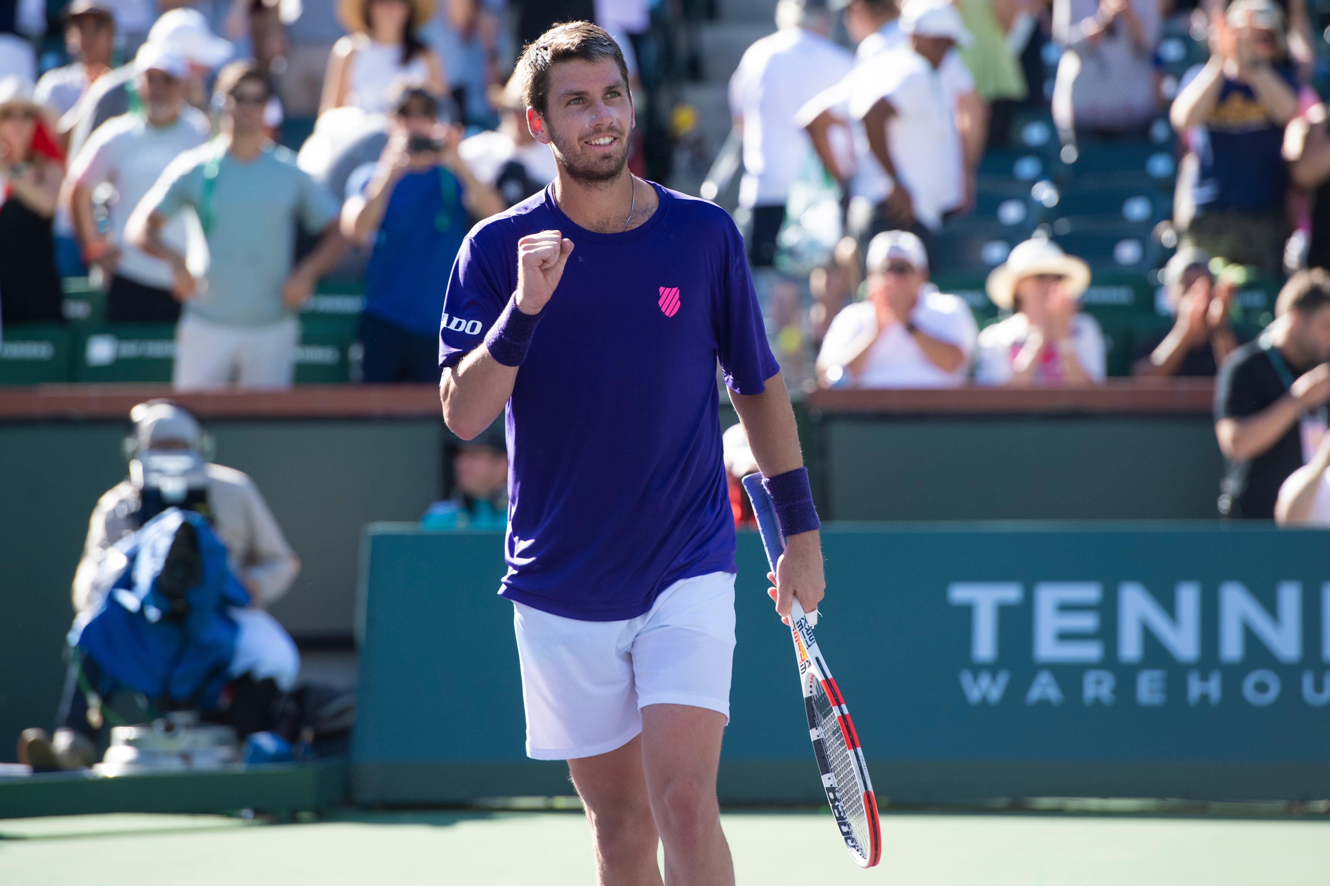 Cameron Norrie, of Britain, looks to the crowd after winning a semifinal match Saturday, Oct. 16, 2021, in Indian Wells, Calif. (AP Photo/John McCoy)