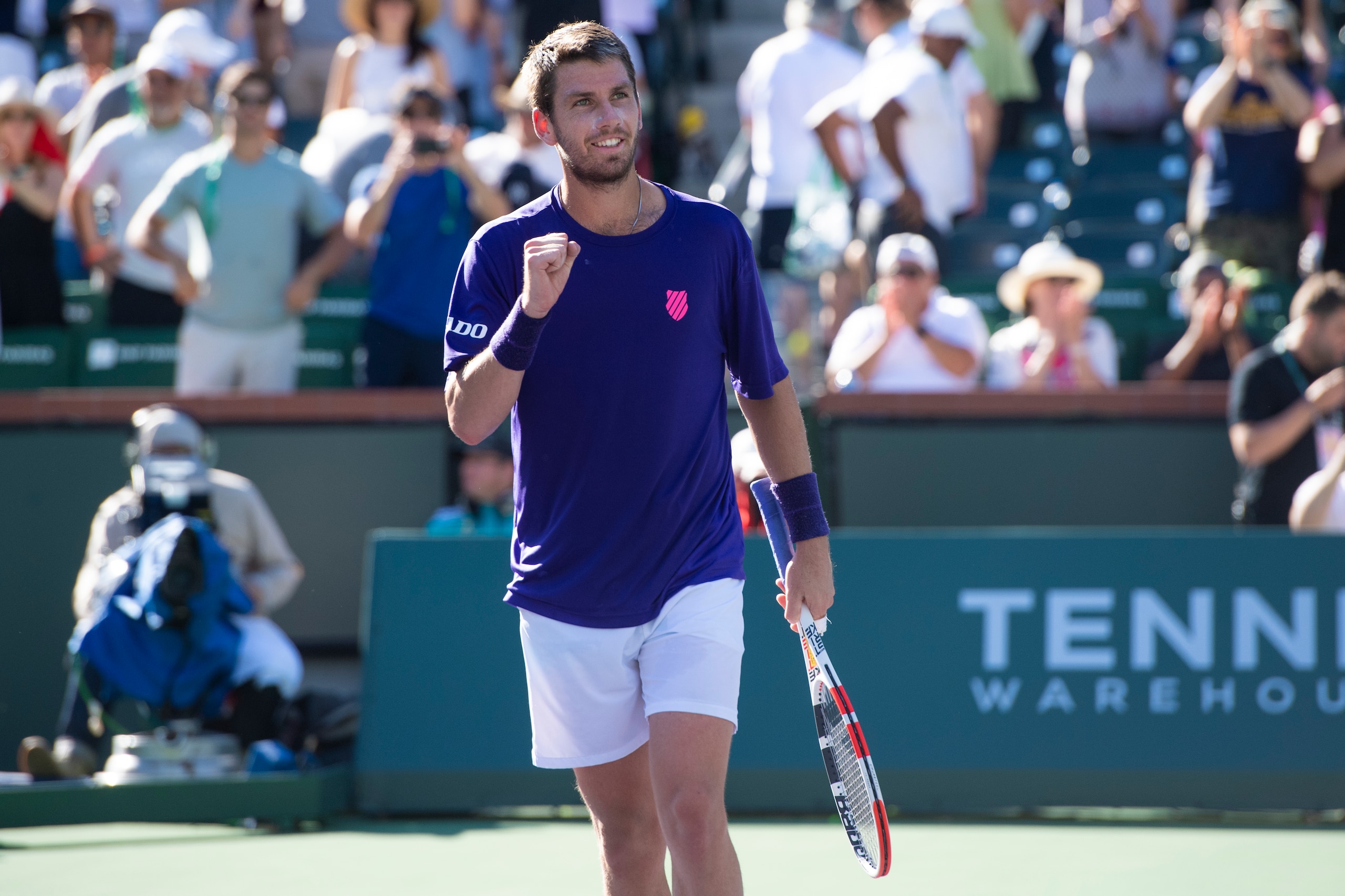 Cameron Norrie, of Britain, looks to the crowd after winning a semifinal match Saturday, Oct. 16, 2021, in Indian Wells, Calif. (AP Photo/John McCoy)