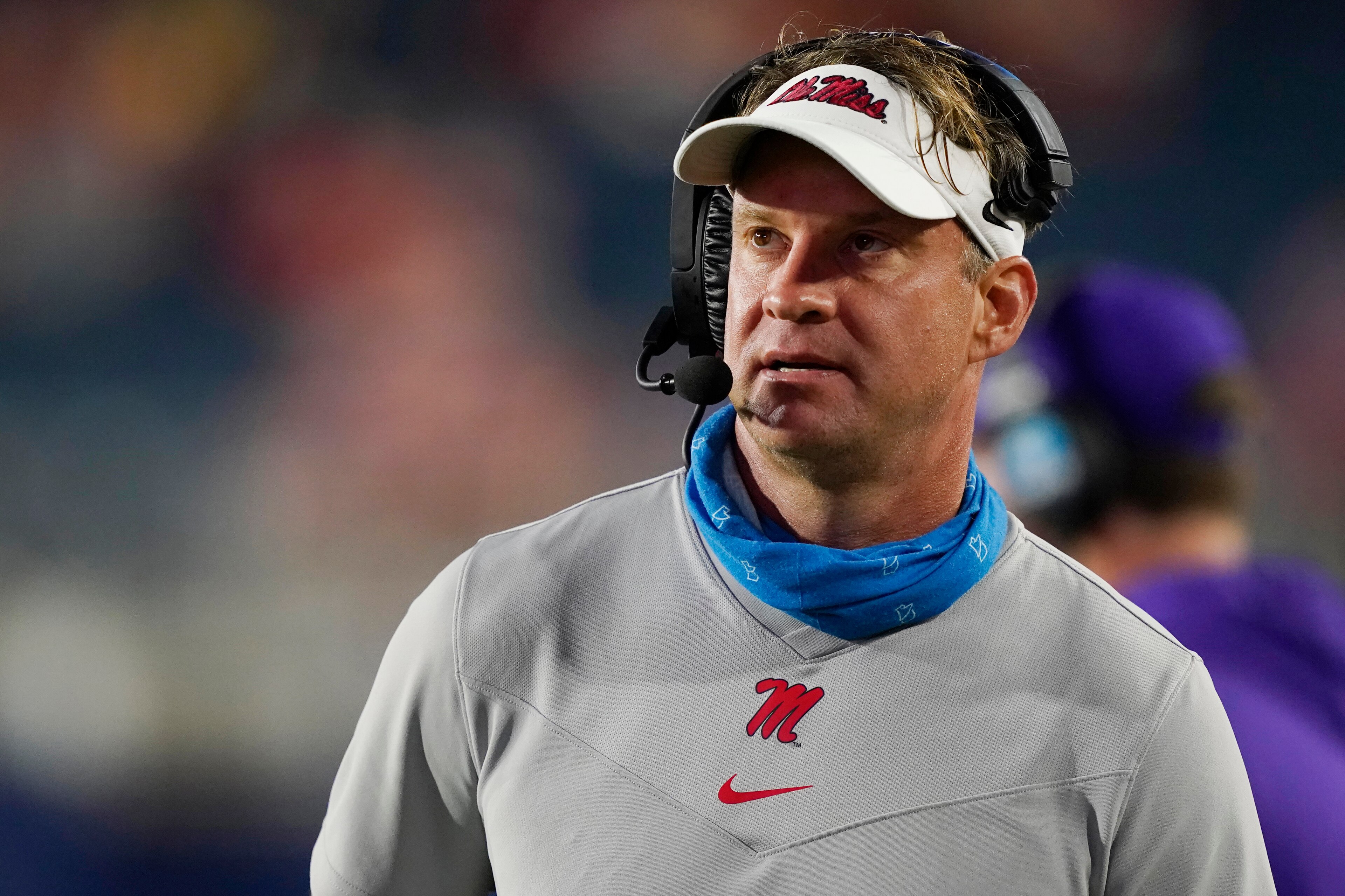 Mississippi head coach Lane Kiffin watches a replay during the second half of the team's NCAA college football game against Tulane on Saturday, Sept. 18, 2021, in Oxford, Miss. Mississippi won 61-21. (AP Photo/Rogelio V. Solis) Mississippi head coach Lane Kiffin watches a replay during the second half of the team's NCAA college football game against Tulane on Saturday, Sept. 18, 2021, in Oxford, Miss. Mississippi won 61-21. (AP Photo/Rogelio V. Solis)