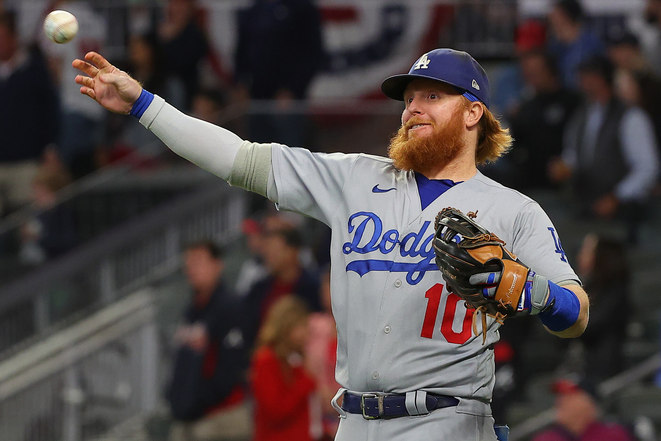 ATLANTA, GEORGIA - OCTOBER 16: Justin Turner #10 of the Los Angeles Dodgers warms up prior to Game One of the National League Championship Series against the Atlanta Braves at Truist Park on October 16, 2021 in Atlanta, Georgia. (Photo by Kevin C. Cox/Getty Images) ATLANTA, GEORGIA - OCTOBER 16: Justin Turner #10 of the Los Angeles Dodgers warms up prior to Game One of the National League Championship Series against the Atlanta Braves at Truist Park on October 16, 2021 in Atlanta, Georgia. (Photo by Kevin C. Cox/Getty Images)
