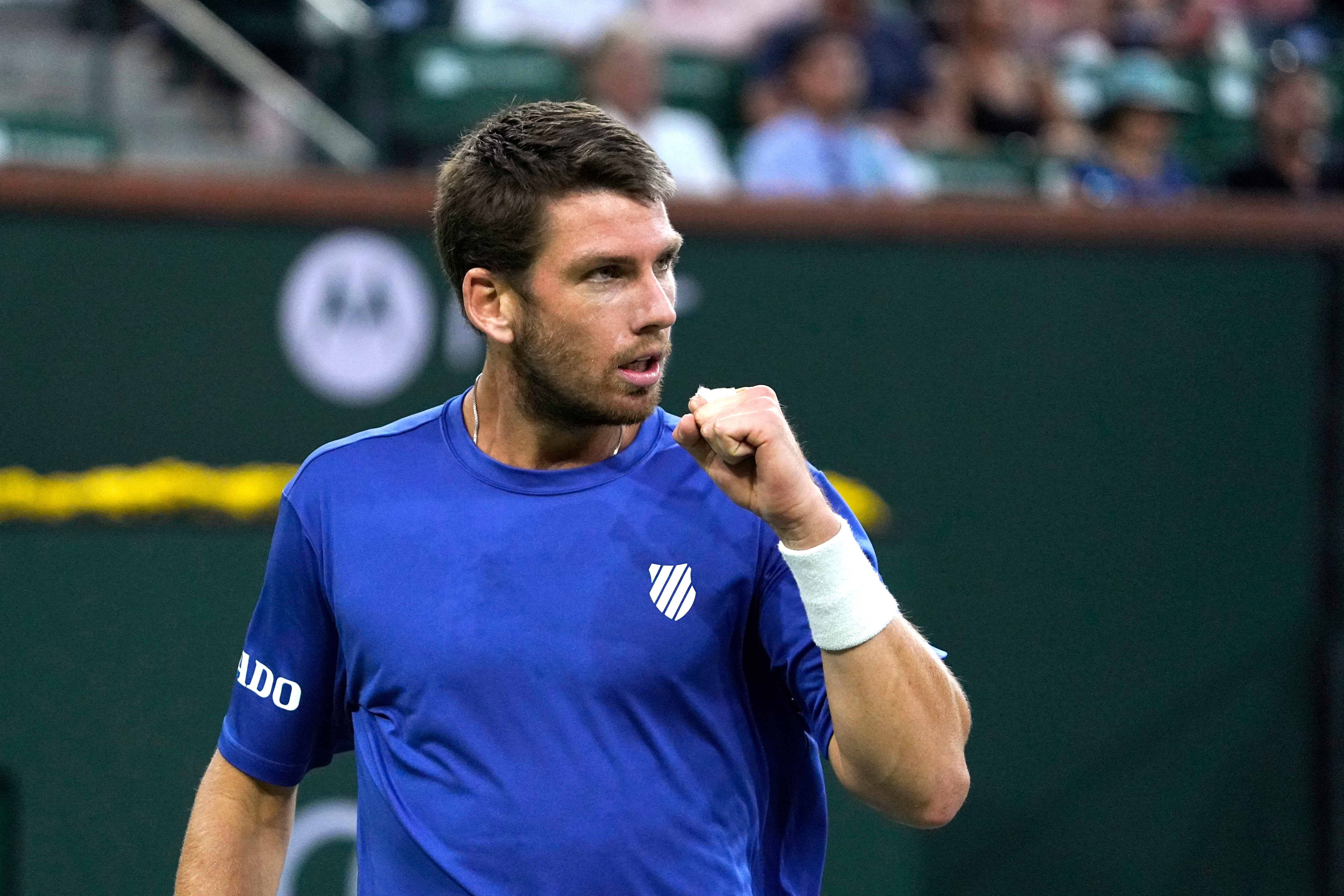 Cameron Norrie, of Britain, reacts after winning a point against Nikoloz Basilashvili, of Georgia, in the singles final at the BNP Paribas Open tennis tournament Sunday, Oct. 17, 2021, in Indian Wells, Calif. (AP Photo/Mark J. Terrill)