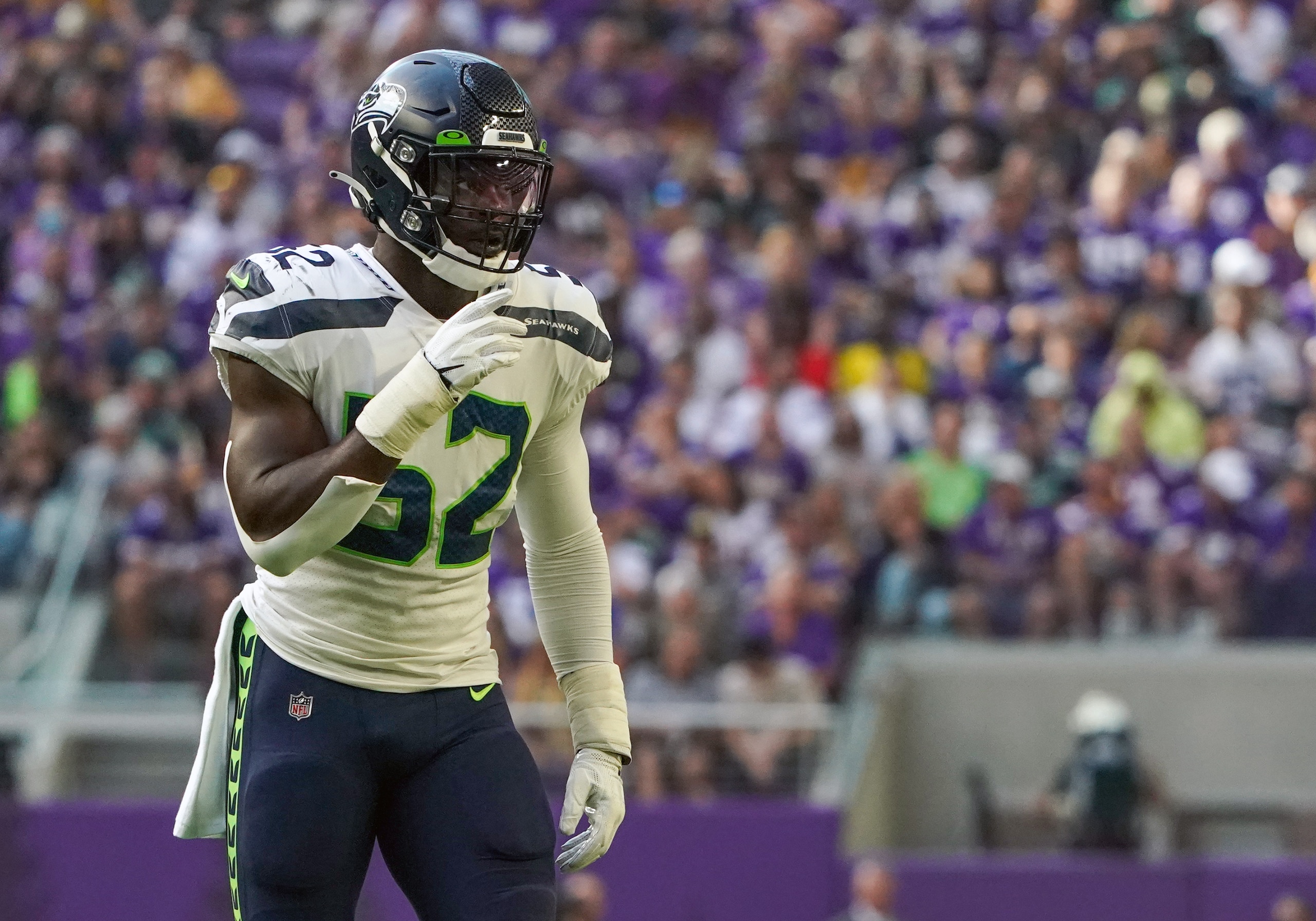 MINNEAPOLIS, MN - SEPTEMBER 26:  Seattle Seahawks Linebacker Darrell Taylor (52) gets into position during a game between the Minnesota Vikings and Seattle Seahawks on September 26, 2021, at U.S. Bank Stadium in Minneapolis, MN.(Photo by Nick Wosika/Icon Sportswire via Getty Images)