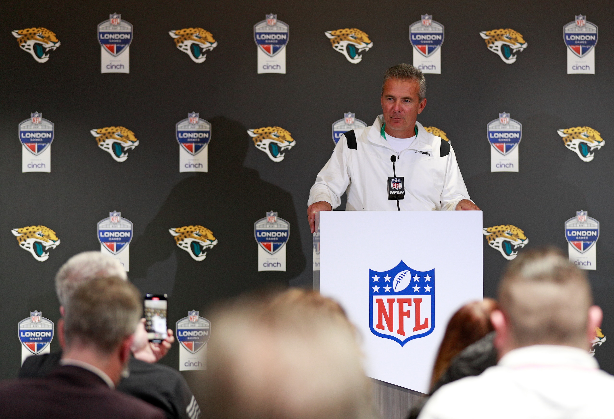 Jacksonville Jaguars head coach Urban Meyer attends a press conference after an NFL football game between the Miami Dolphins and the Jacksonville Jaguars at the Tottenham Hotspur stadium in London, England, Sunday, Oct. 17, 2021. The Jaguars won the match 23-20. (AP Photo/Ian Walton)