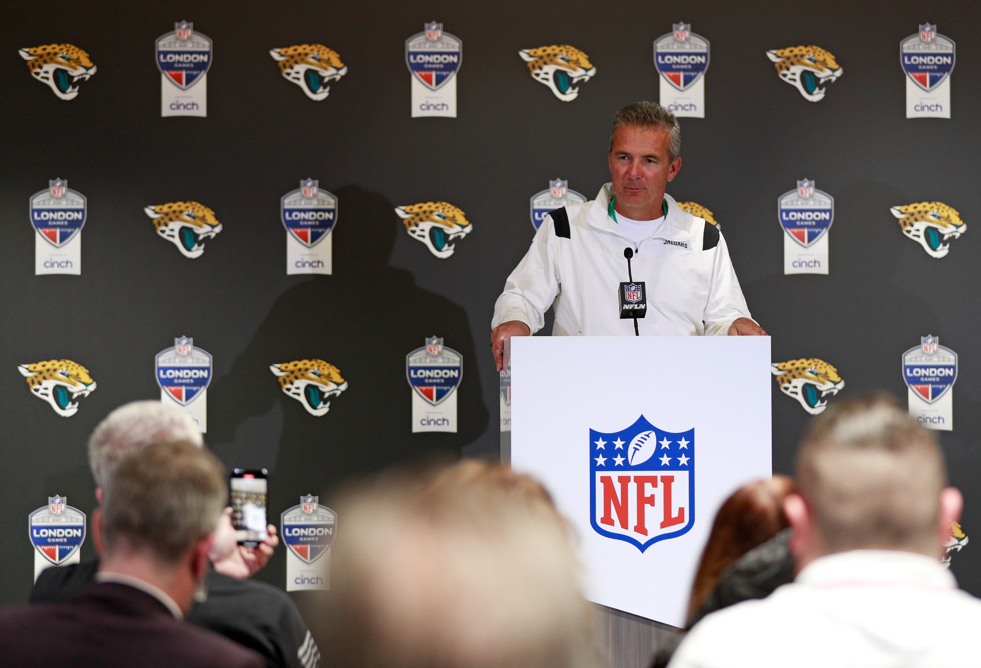 Jacksonville Jaguars head coach Urban Meyer attends a press conference after an NFL football game between the Miami Dolphins and the Jacksonville Jaguars at the Tottenham Hotspur stadium in London, England, Sunday, Oct. 17, 2021. The Jaguars won the match 23-20. (AP Photo/Ian Walton)