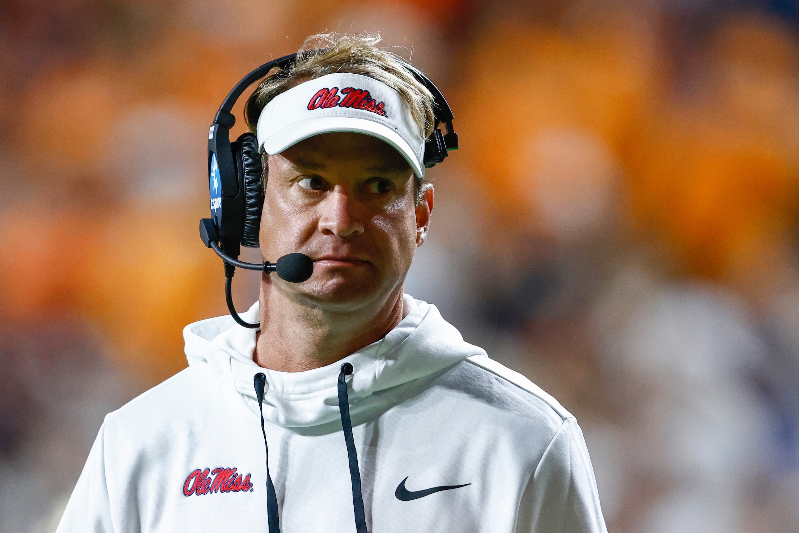 Mississippi coach Lane Kiffin walks the sideline during the second half of the team's NCAA college football game against Tennessee on Saturday, Oct. 16, 2021, in Knoxville, Tenn. Mississippi won 31-26. (AP Photo/Wade Payne) Mississippi coach Lane Kiffin walks the sideline during the second half of the team's NCAA college football game against Tennessee on Saturday, Oct. 16, 2021, in Knoxville, Tenn. Mississippi won 31-26. (AP Photo/Wade Payne)