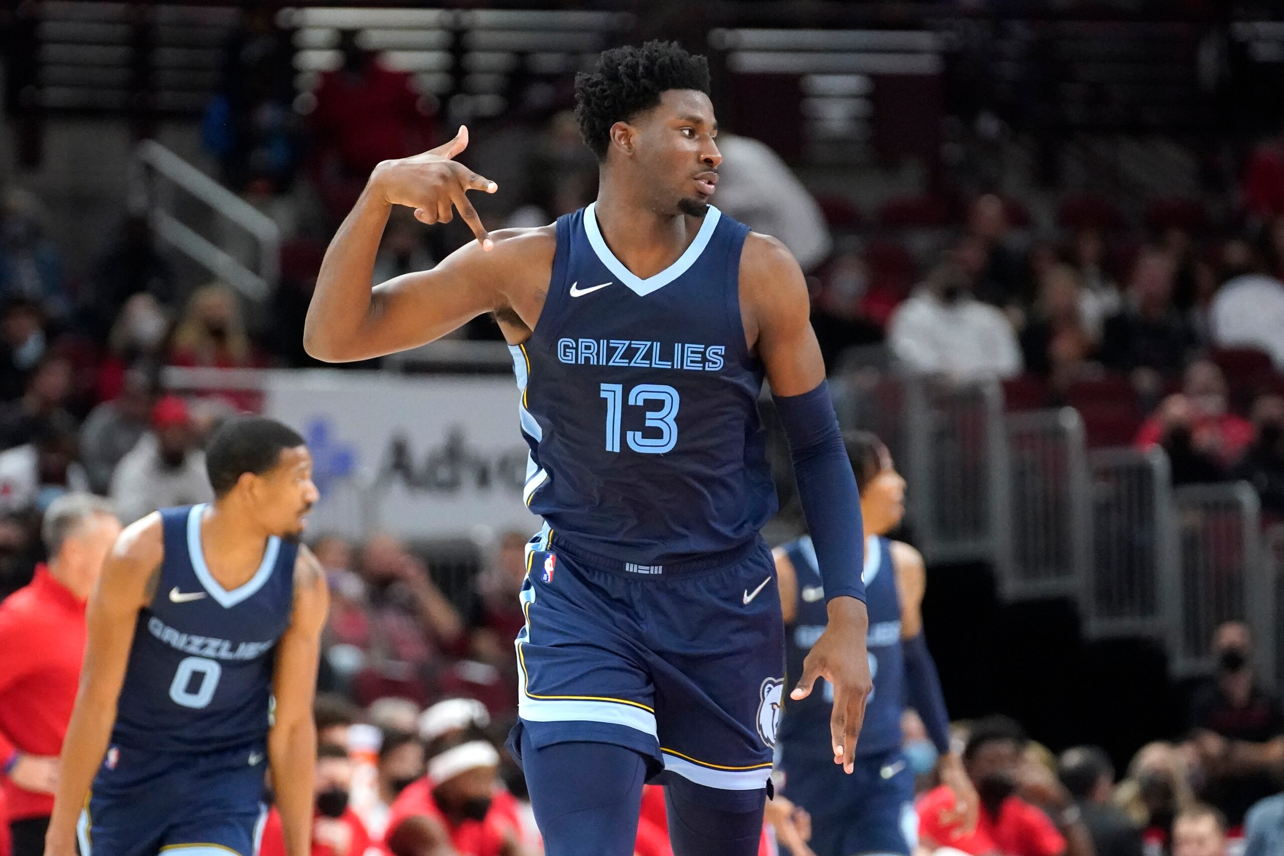 Memphis Grizzlies' Jaren Jackson Jr. celebrates his 3-point basket during the first half of the team's NBA preseason basketball game against the Chicago Bulls on Friday, Oct. 15, 2021, in Chicago. (AP Photo/Charles Rex Arbogast)