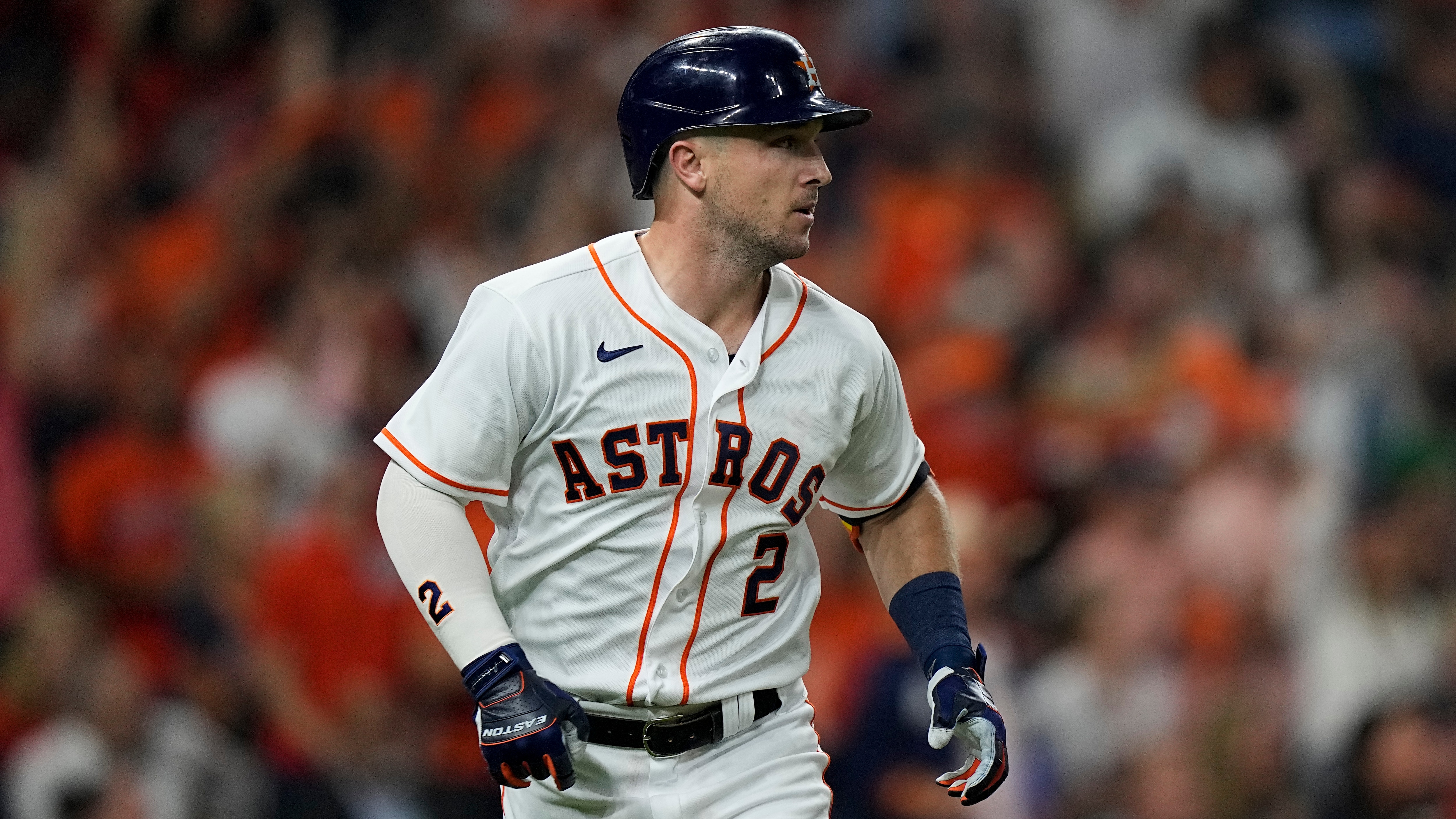 Houston Astros' Alex Bregman runs to first against the Boston Red Sox during the first inning in Game 1 of baseball's American League Championship Series Friday, Oct. 15, 2021, in Houston. (AP Photo/David J. Phillip)
