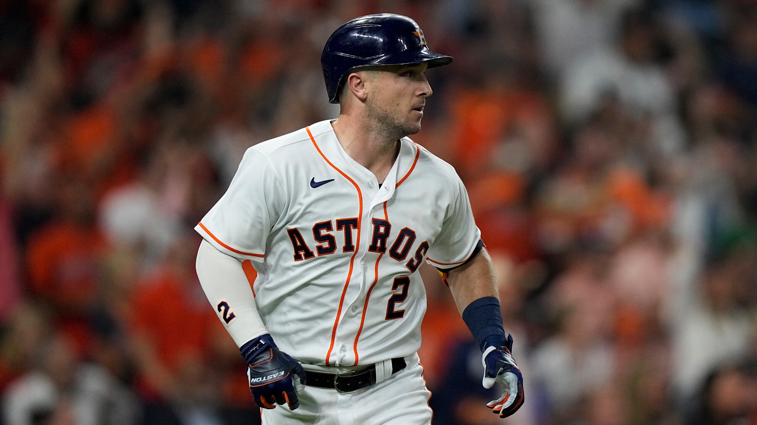 Houston Astros' Alex Bregman runs to first against the Boston Red Sox during the first inning in Game 1 of baseball's American League Championship Series Friday, Oct. 15, 2021, in Houston. (AP Photo/David J. Phillip)