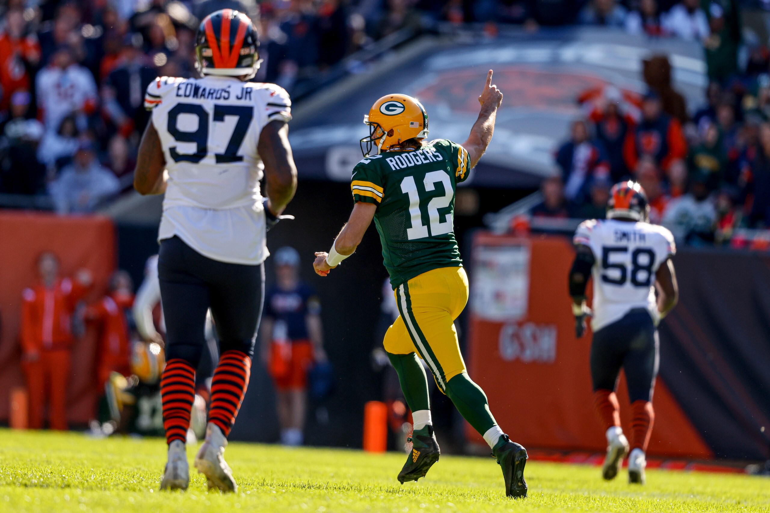 Green Bay Packers quarterback Aaron Rodgers (12) reacts on the field during an NFL football game against the Chicago Bears Sunday, Oct 17. 2021, in Chicago. (AP Photo/Jeffrey Phelps)