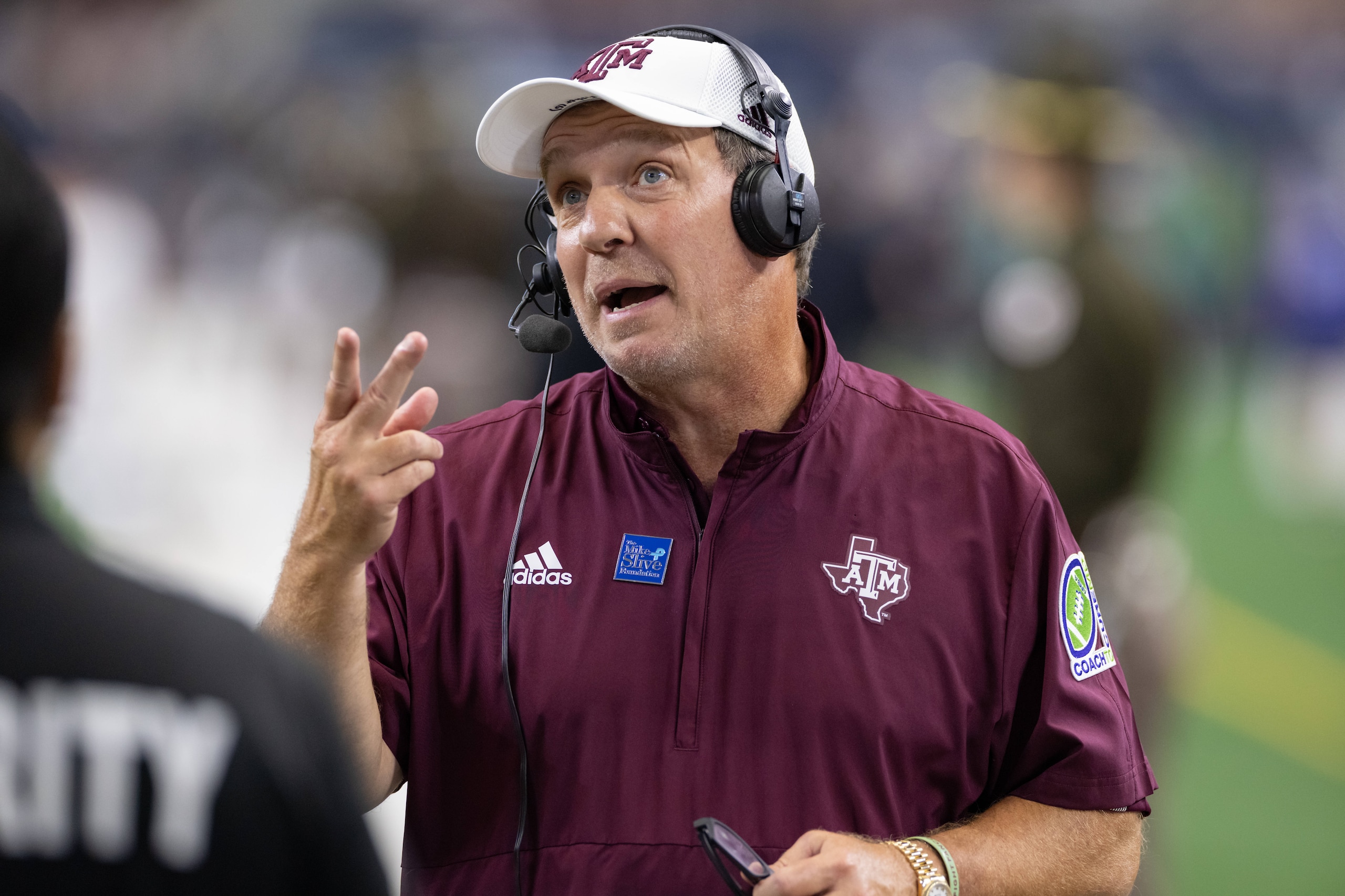 ARLINGTON, TX - SEPTEMBER 25: Texas A&M Aggies head coach Jimbo Fisher is interviewed on the field during the Southwest Classic college football game between the Texas A&M Aggies and Arkansas Razorbacks on September 25, 2021 at AT&T Stadium in Arlington, TX. (Photo by Matthew Visinsky/Icon Sportswire via Getty Images) ARLINGTON, TX - SEPTEMBER 25: Texas A&M Aggies head coach Jimbo Fisher is interviewed on the field during the Southwest Classic college football game between the Texas A&M Aggies and Arkansas Razorbacks on September 25, 2021 at AT&T Stadium in Arlington, TX. (Photo by Matthew Visinsky/Icon Sportswire via Getty Images)