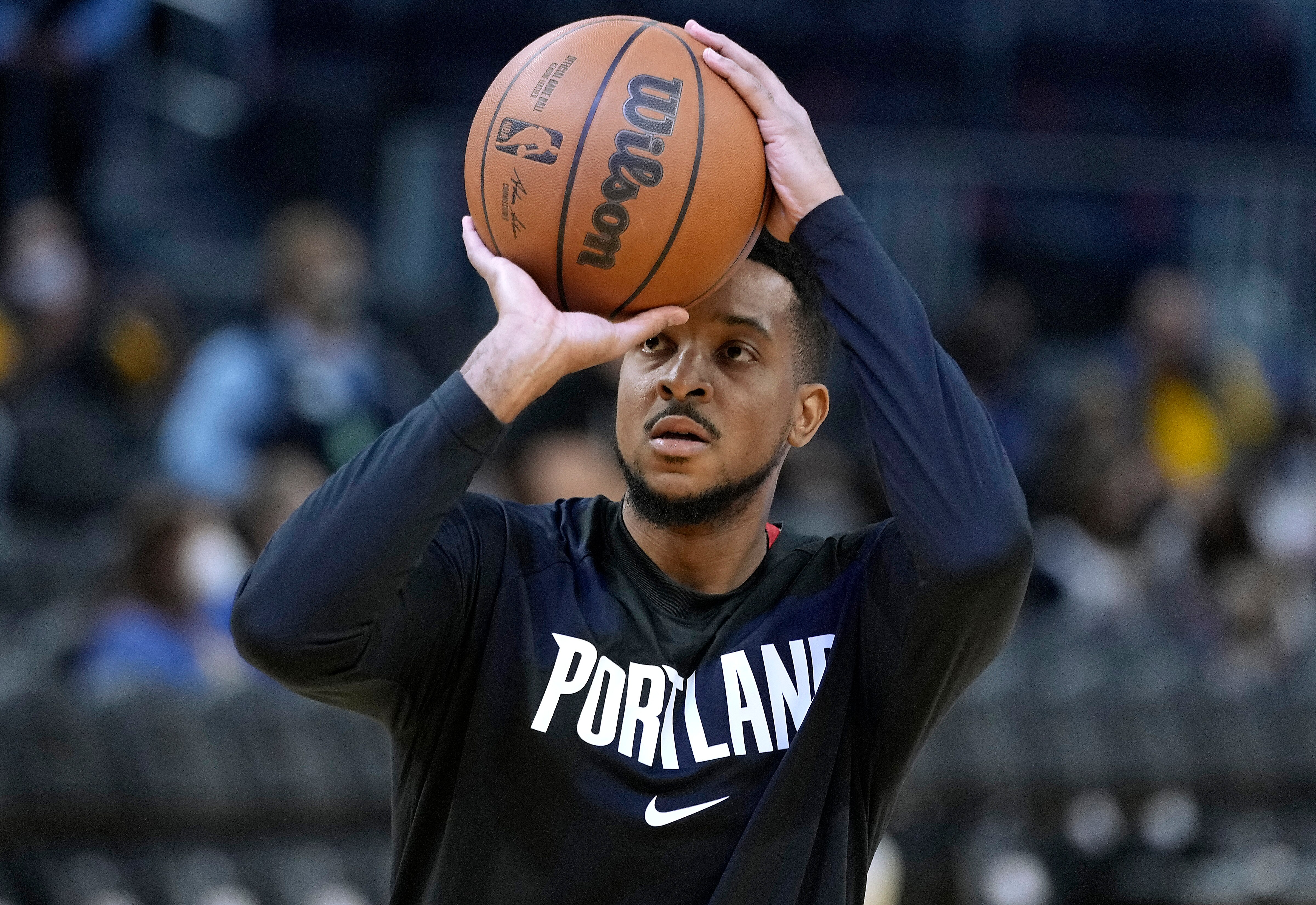SAN FRANCISCO, CALIFORNIA - OCTOBER 15: CJ McCollum #3 of the Portland Trail Blazers warms up prior to the start of the game against the Golden State Warriors at Chase Center on October 15, 2021 in San Francisco, California. NOTE TO USER: User expressly acknowledges and agrees that, by downloading and/or using this photograph, User is consenting to the terms and conditions of the Getty Images License Agreement. (Photo by Thearon W. Henderson/Getty Images)