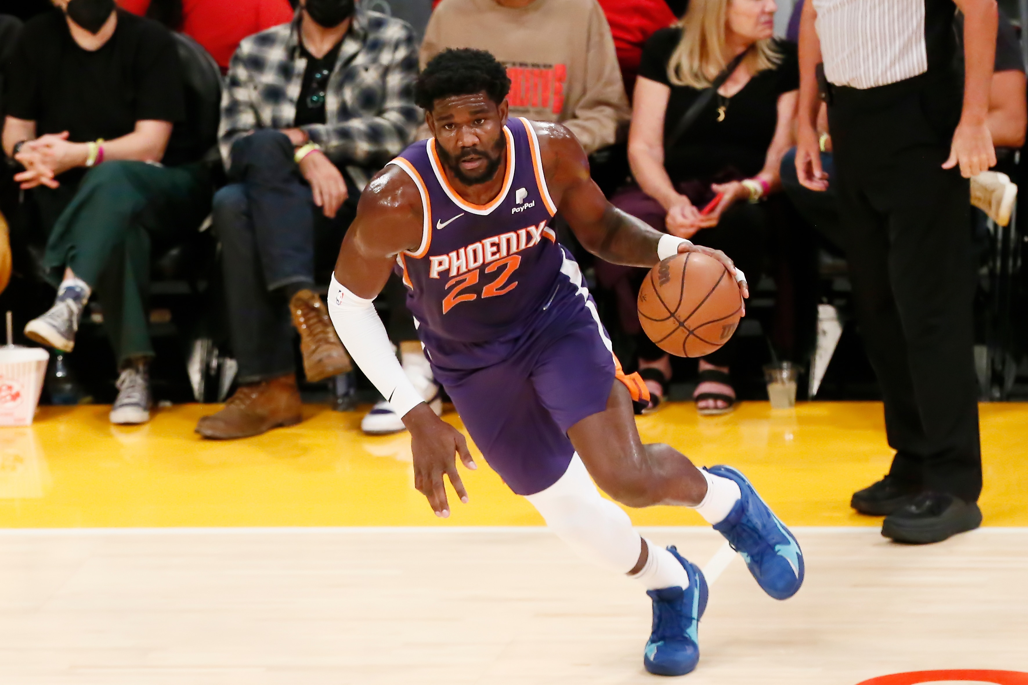 LOS ANGELES, CA - OCT 10: Deandre Ayton #22 of the Phoenix Suns dribbles the ball during a preseason game against the Los Angeles Lakers on October 10, 2021 at STAPLES Center in Los Angeles, California. NOTE TO USER: User expressly acknowledges and agrees that, by downloading and/or using this Photograph, user is consenting to the terms and conditions of the Getty Images License Agreement. Mandatory Copyright Notice: Copyright 2021 NBAE  (Photo by Chris Elise/NBAE via Getty Images)