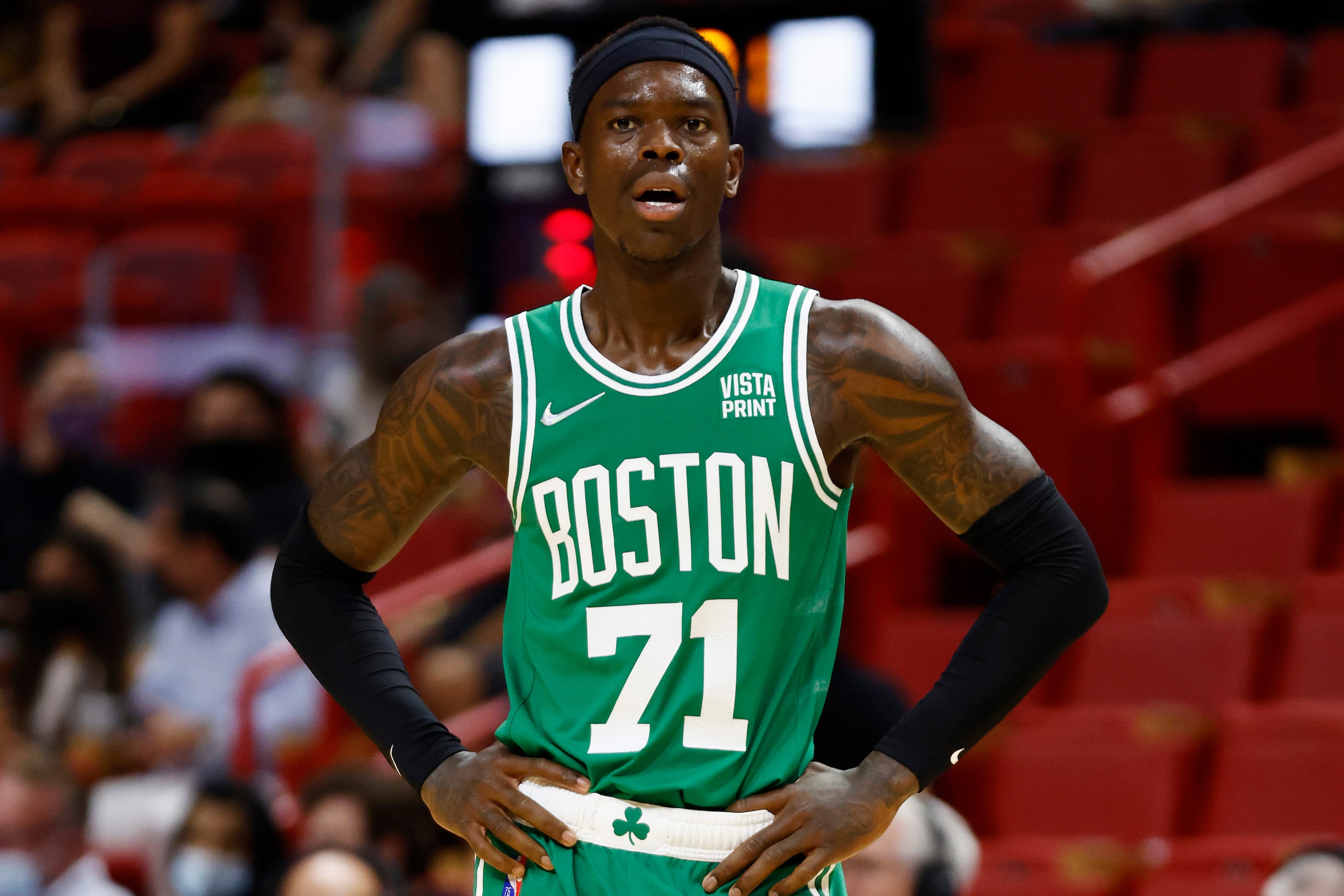 MIAMI, FLORIDA - OCTOBER 15: Dennis Schroder #71 of the Boston Celtics looks on against the Miami Heat during the first quarter of a preseason game at FTX Arena on October 15, 2021 in Miami, Florida. NOTE TO USER: User expressly acknowledges and agrees that, by downloading and or using this photograph, User is consenting to the terms and conditions of the Getty Images License Agreement. (Photo by Michael Reaves/Getty Images)