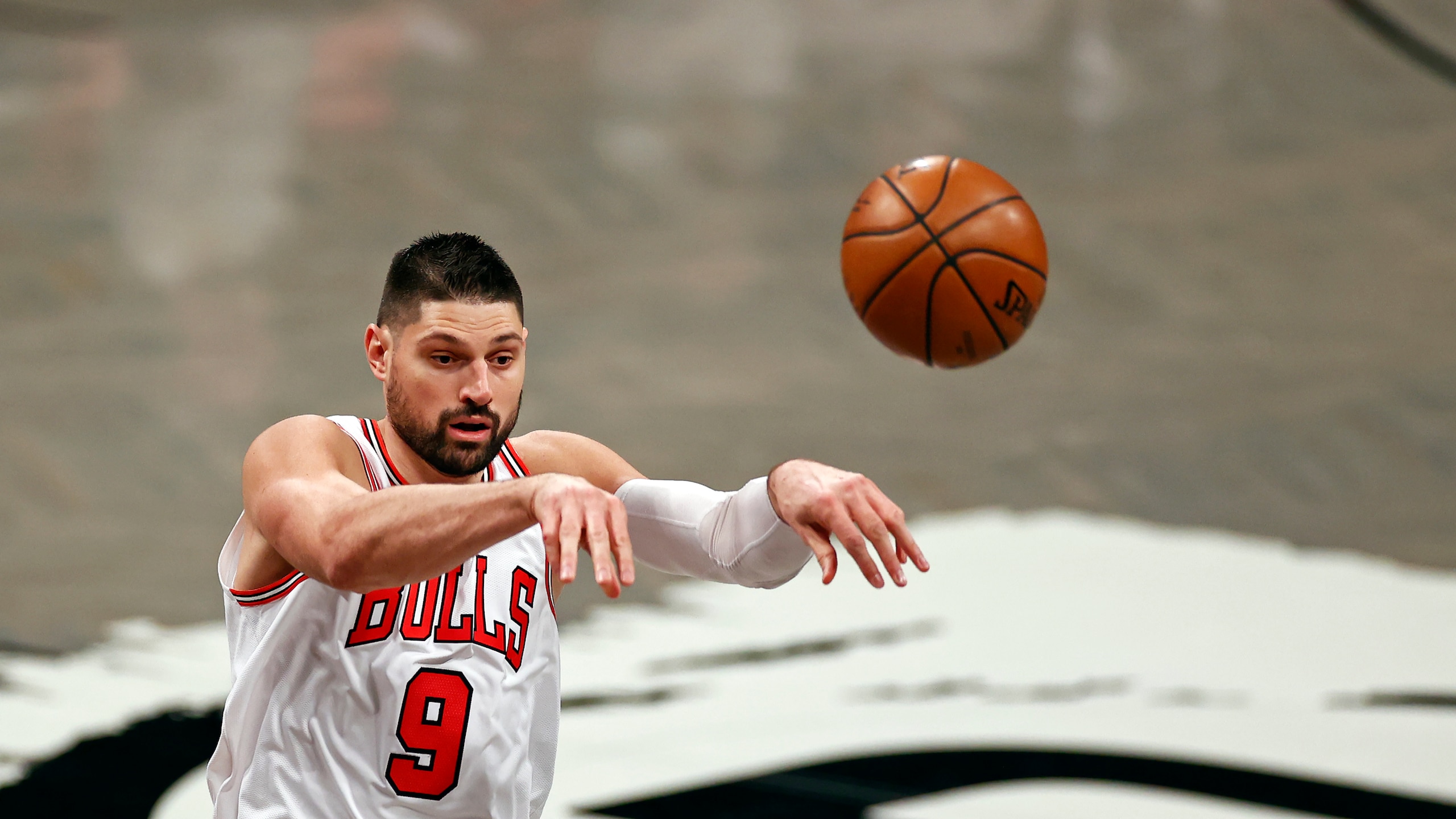 Chicago Bulls center Nikola Vucevic (9) passes the ball against the Brooklyn Nets during the first half of an NBA basketball game Saturday, May 15, 2021, in New York. (AP Photo/Adam Hunger)