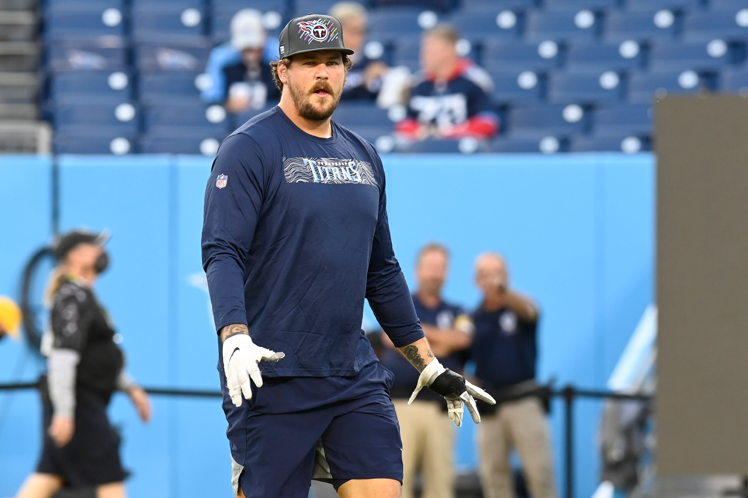 Tennessee Titans offensive tackle Taylor Lewan warms up before an NFL football game against the Buffalo Bills Monday, Oct. 18, 2021, in Nashville, Tenn. (AP Photo/Mark Zaleski) Tennessee Titans offensive tackle Taylor Lewan warms up before an NFL football game against the Buffalo Bills Monday, Oct. 18, 2021, in Nashville, Tenn. (AP Photo/Mark Zaleski)