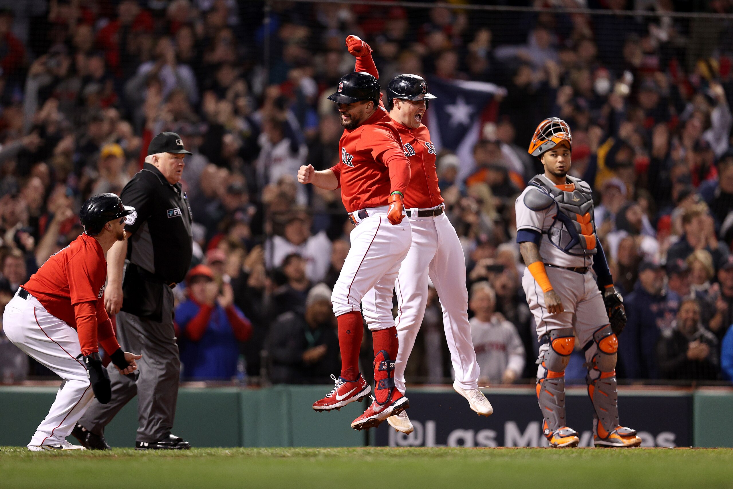 BOSTON, MASSACHUSETTS - OCTOBER 18: Kyle Schwarber #18 of the Boston Red Sox celebrates with Hunter Renfroe #10 after Schwarber hit a grand slam home run against the Houston Astros in the second inning of Game Three of the American League Championship Series at Fenway Park on October 18, 2021 in Boston, Massachusetts. (Photo by Maddie Meyer/Getty Images) BOSTON, MASSACHUSETTS - OCTOBER 18: Kyle Schwarber #18 of the Boston Red Sox celebrates with Hunter Renfroe #10 after Schwarber hit a grand slam home run against the Houston Astros in the second inning of Game Three of the American League Championship Series at Fenway Park on October 18, 2021 in Boston, Massachusetts. (Photo by Maddie Meyer/Getty Images)