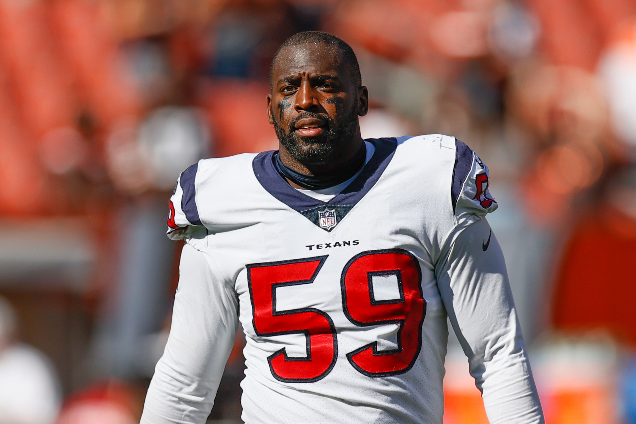 Houston Texans defensive end Whitney Mercilus walks off the field after a 31-21 loss to the Cleveland Browns in an NFL football game, Sunday, Sept. 19, 2021, in Cleveland. (AP Photo/Ron Schwane)
