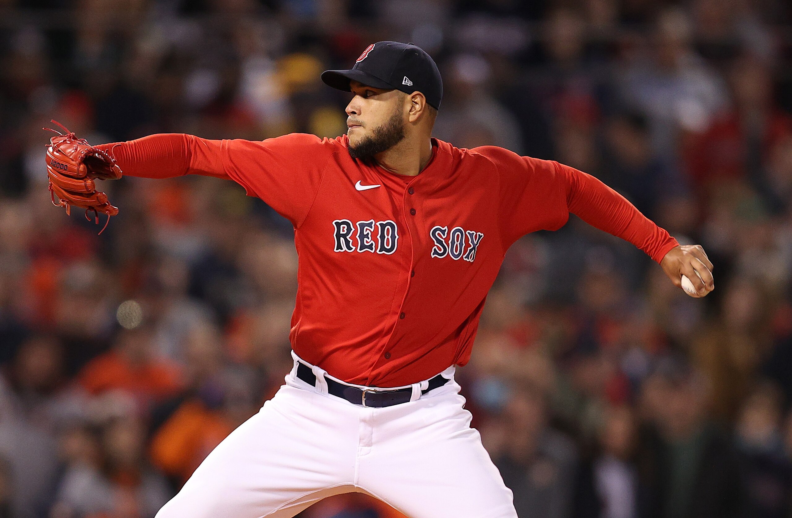 BOSTON, MASSACHUSETTS - OCTOBER 18: Eduardo Rodriguez #57 of the Boston Red Sox pitches against the Houston Astros in the first inning of Game Three of the American League Championship Series at Fenway Park on October 18, 2021 in Boston, Massachusetts. (Photo by Maddie Meyer/Getty Images)
