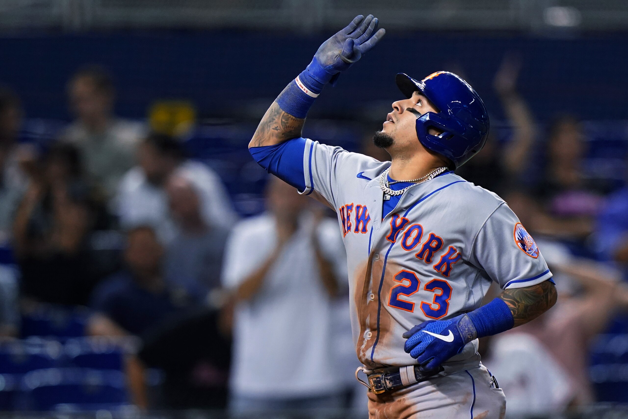 New York Mets' Javier Baez celebrates his home run during the third inning of the team's baseball game against the Miami Marlins, Thursday, Sept. 9, 2021, in Miami. (AP Photo/Wilfredo Lee)