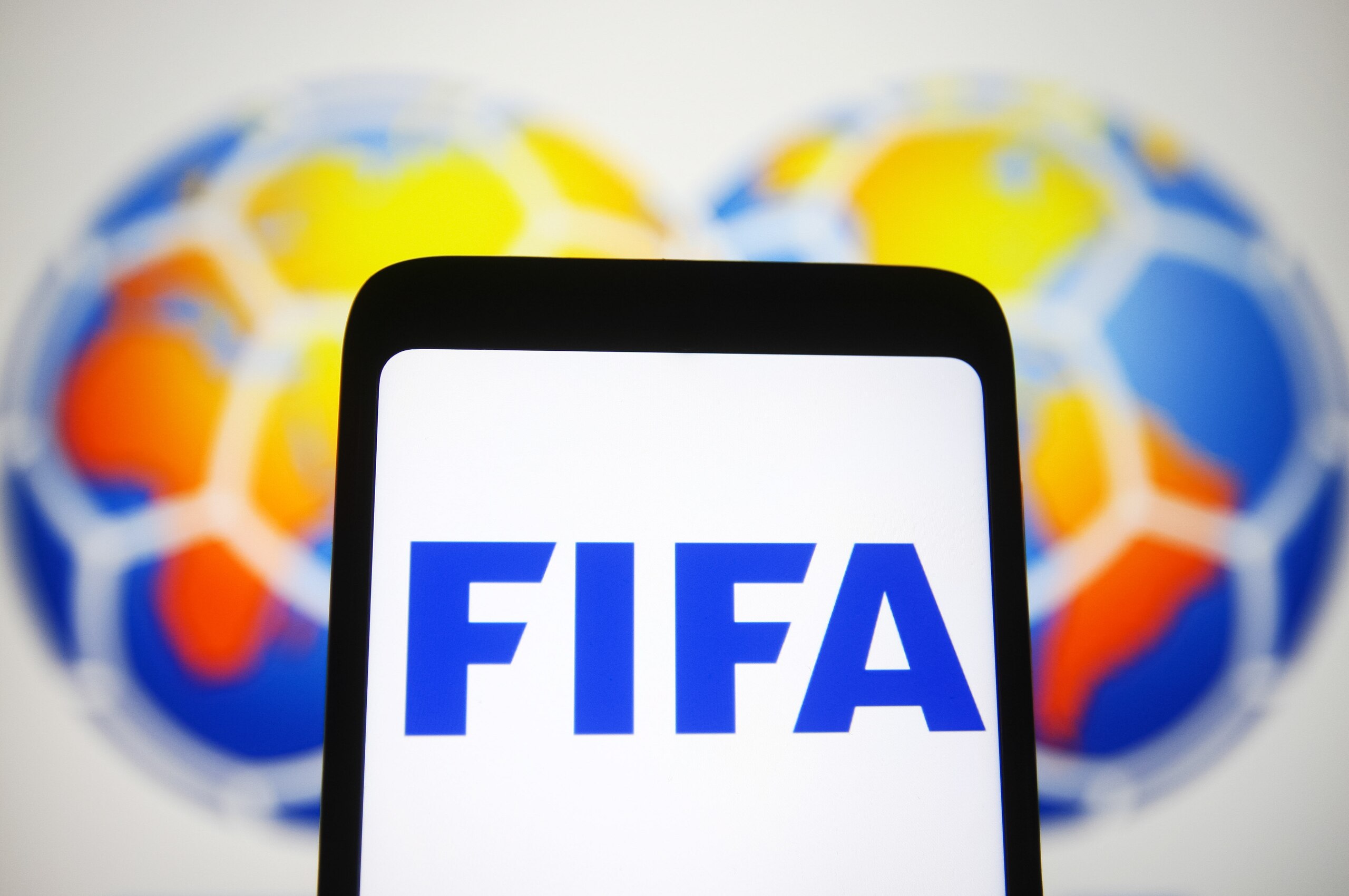 UKRAINE - 2021/10/15: In this photo illustration, FIFA logo is seen on a smartphone screen. (Photo Illustration by Pavlo Gonchar/SOPA Images/LightRocket via Getty Images)
