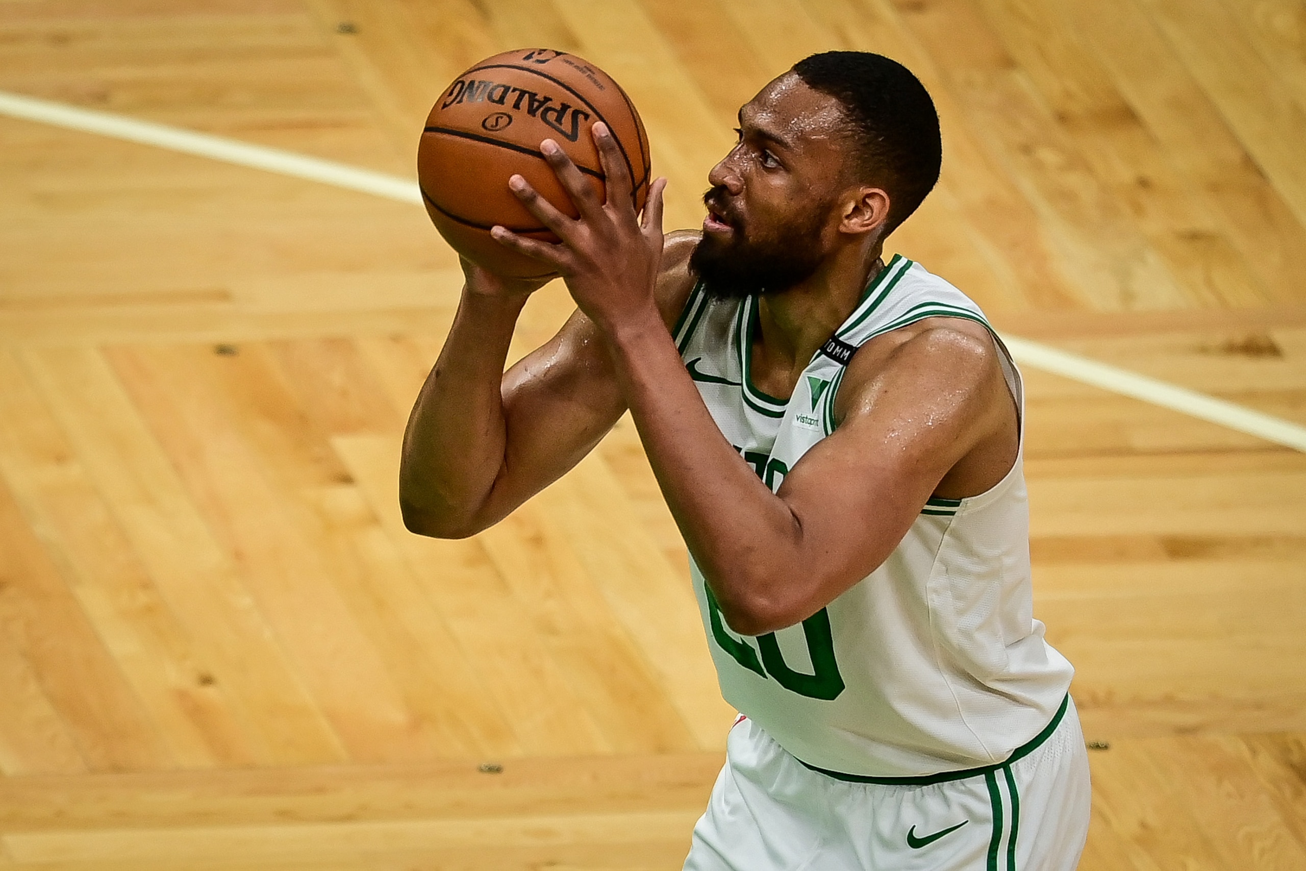BOSTON, MASSACHUSETTS - MAY 30: Jabari Parker #20 of the Boston Celtics shoots a free throw against the Brooklyn Nets during Game Four of the Eastern Conference first round series at TD Garden on May 30, 2021 in Boston, Massachusetts. NOTE TO USER: User expressly acknowledges and agrees that, by downloading and or using this photograph, User is consenting to the terms and conditions of the Getty Images License Agreement. (Photo by Maddie Malhotra/Getty Images) BOSTON, MASSACHUSETTS - MAY 30: Jabari Parker #20 of the Boston Celtics shoots a free throw against the Brooklyn Nets during Game Four of the Eastern Conference first round series at TD Garden on May 30, 2021 in Boston, Massachusetts. NOTE TO USER: User expressly acknowledges and agrees that, by downloading and or using this photograph, User is consenting to the terms and conditions of the Getty Images License Agreement. (Photo by Maddie Malhotra/Getty Images)