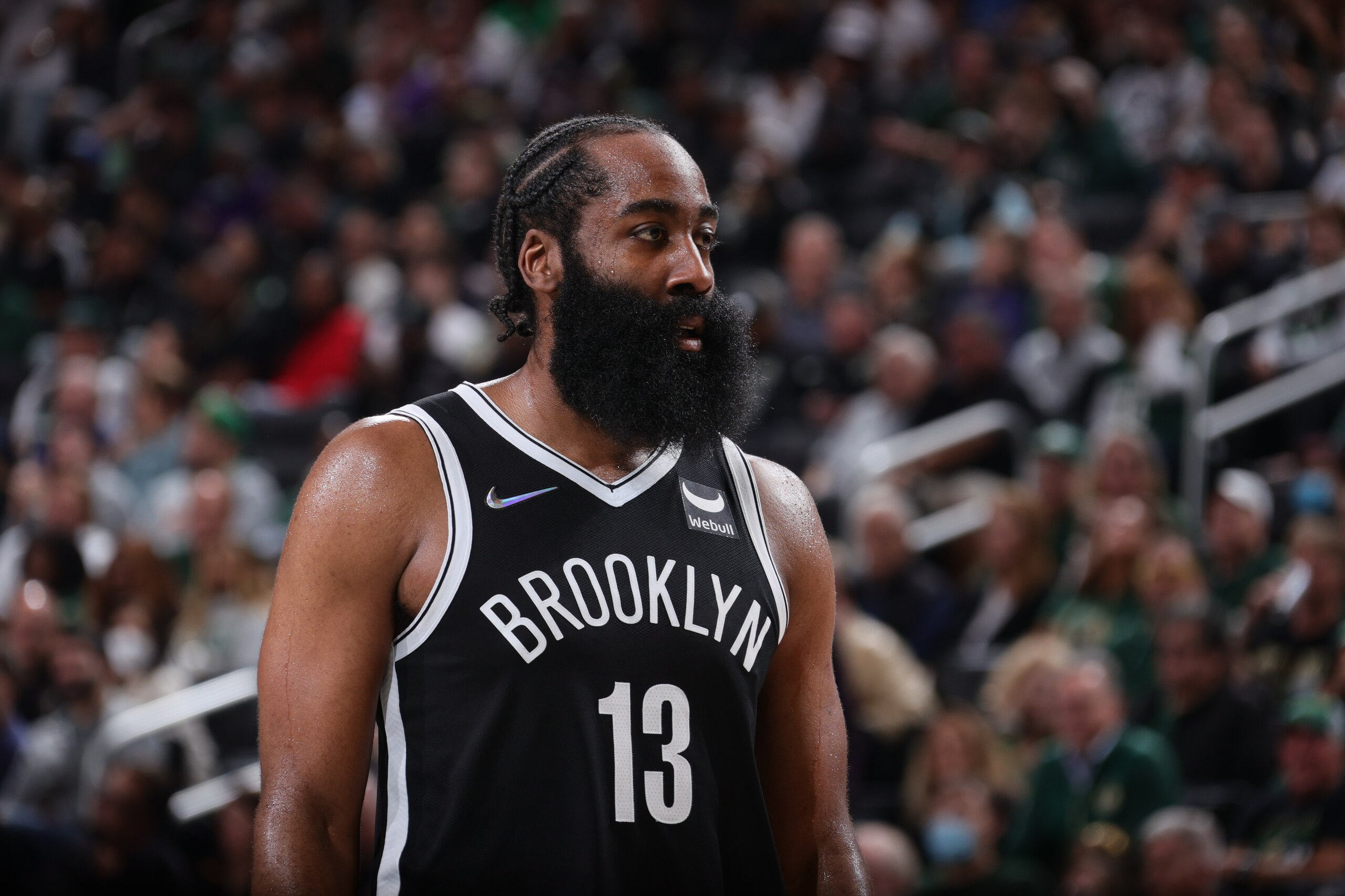MILWAUKEE, WI - OCTOBER 19: James Harden #13 of the Brooklyn Nets looks on during the game against the Milwaukee Bucks on October 19, 2021 at the Fiserv Forum Center in Milwaukee, Wisconsin. NOTE TO USER: User expressly acknowledges and agrees that, by downloading and or using this Photograph, user is consenting to the terms and conditions of the Getty Images License Agreement. Mandatory Copyright Notice: Copyright 2021 NBAE (Photo by Nathaniel S. Butler/NBAE via Getty Images).