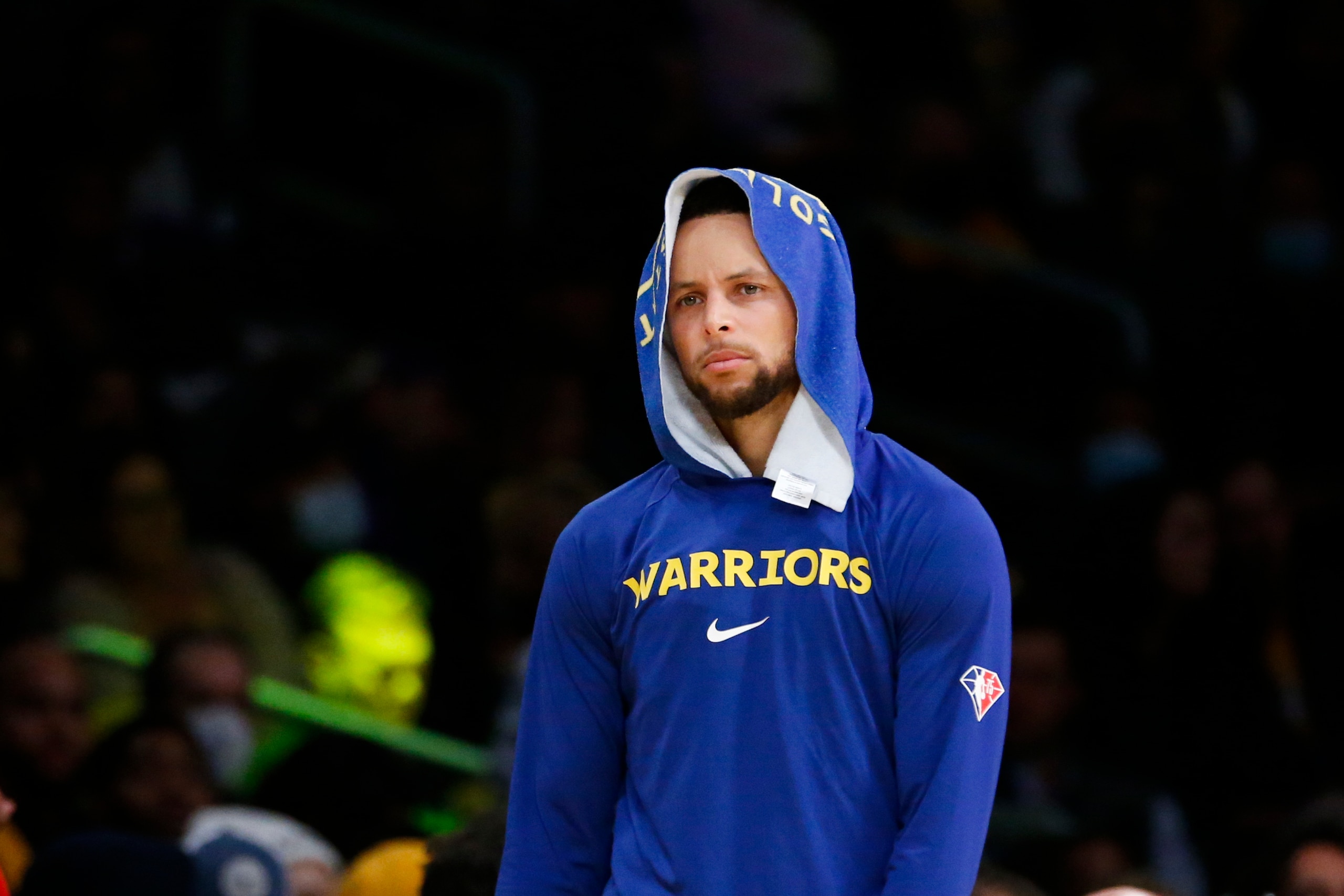 Golden State Warriors guard Stephen Curry (30) watches during the second half of an NBA basketball game against the Los Angeles Lakers in Los Angeles, Tuesday, Oct. 19, 2021. The Warriors won 121-114. (AP Photo/Ringo H.W. Chiu)