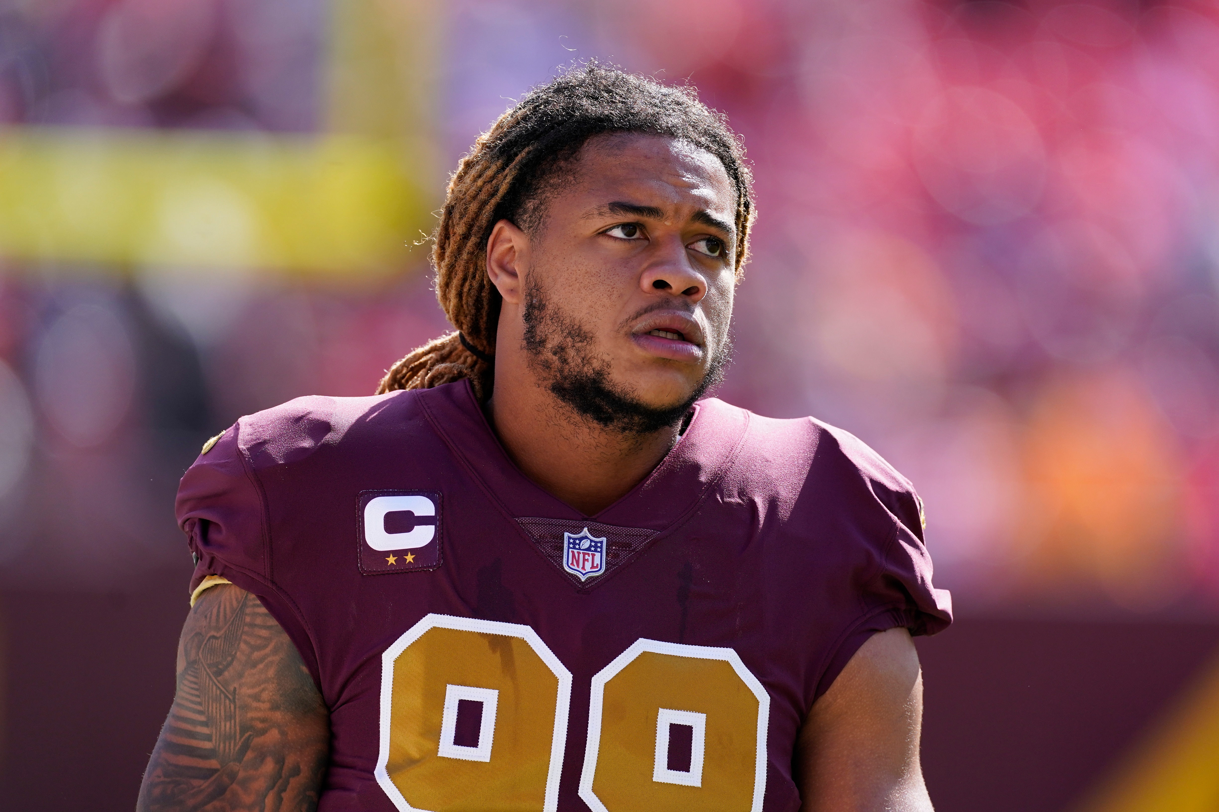 Washington Football Team defensive end Chase Young (99) on the field during pregame warmups prior to the start of the first half of an NFL football game, Sunday, Oct. 17, 2021, in Landover, Md. (AP Photo/Alex Brandon)