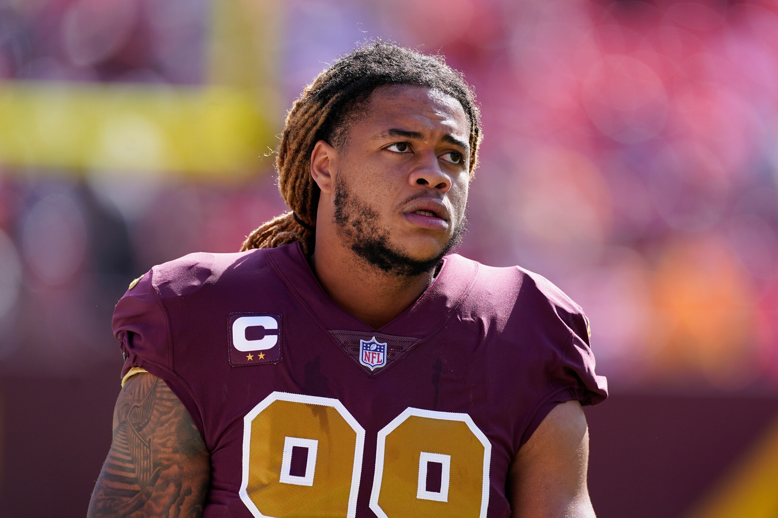Washington Football Team defensive end Chase Young (99) on the field during pregame warmups prior to the start of the first half of an NFL football game, Sunday, Oct. 17, 2021, in Landover, Md. (AP Photo/Alex Brandon)