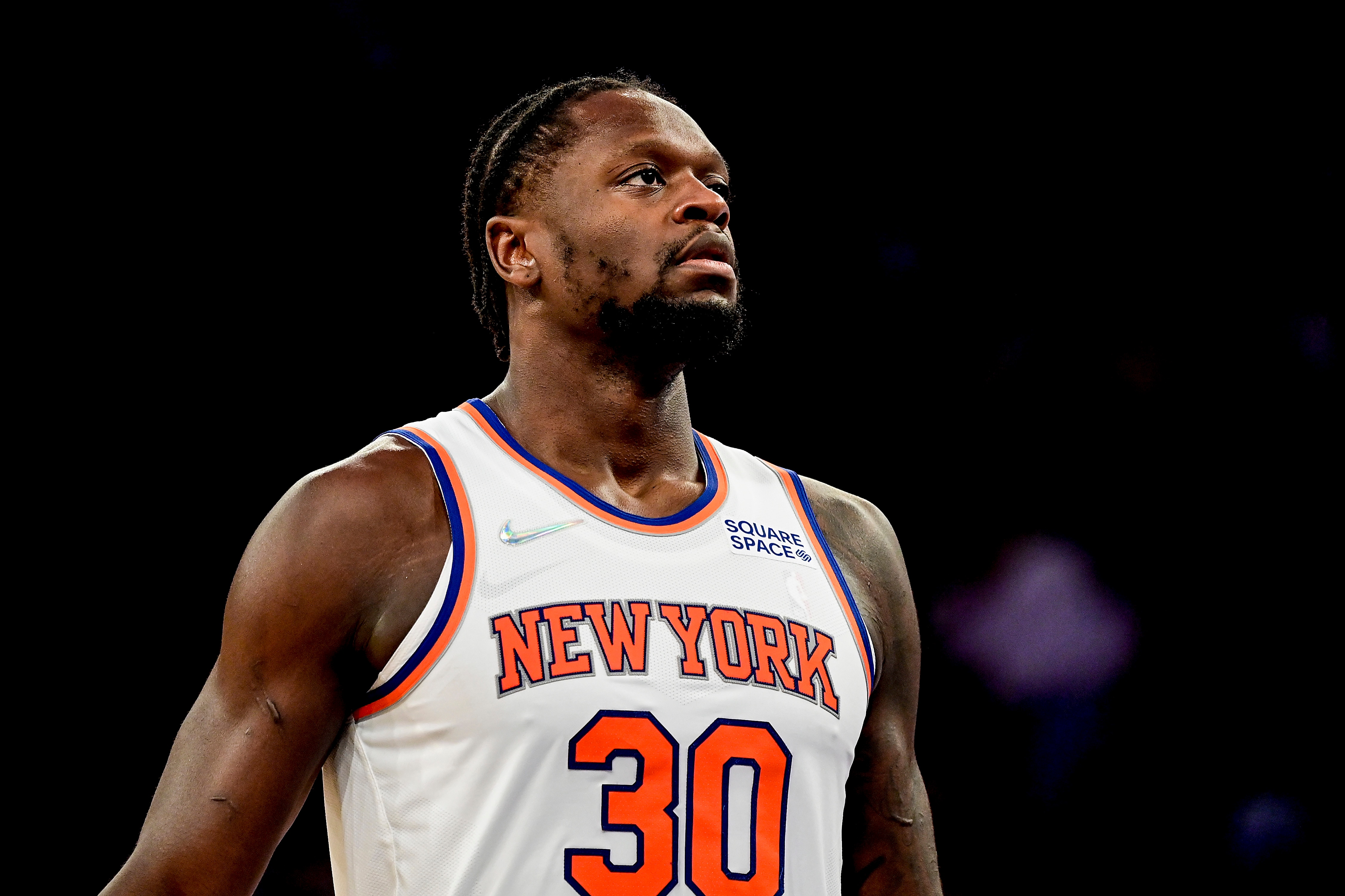 NEW YORK, NEW YORK - OCTOBER 15:  Julius Randle #30 of the New York Knicks looks on against the Washington Wizards during a preseason game at Madison Square Garden on October 15, 2021 in New York City. NOTE TO USER: User expressly acknowledges and agrees that, by downloading and or using this photograph, user is consenting to the terms and conditions of the Getty Images License Agreement. (Photo by Steven Ryan/Getty Images)