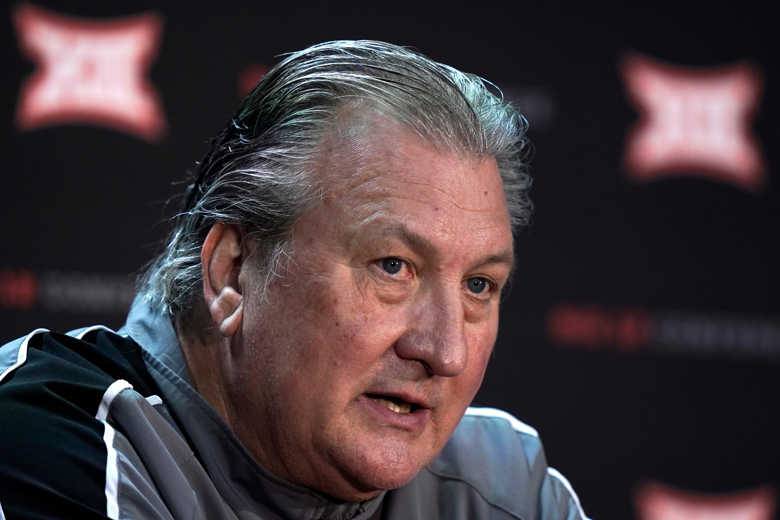 West Virginia coach Bob Huggins speaks to the media during Big 12 NCAA college basketball media day Wednesday, Oct. 20, 2021, in Kansas City, Mo. (AP Photo/Charlie Riedel)
