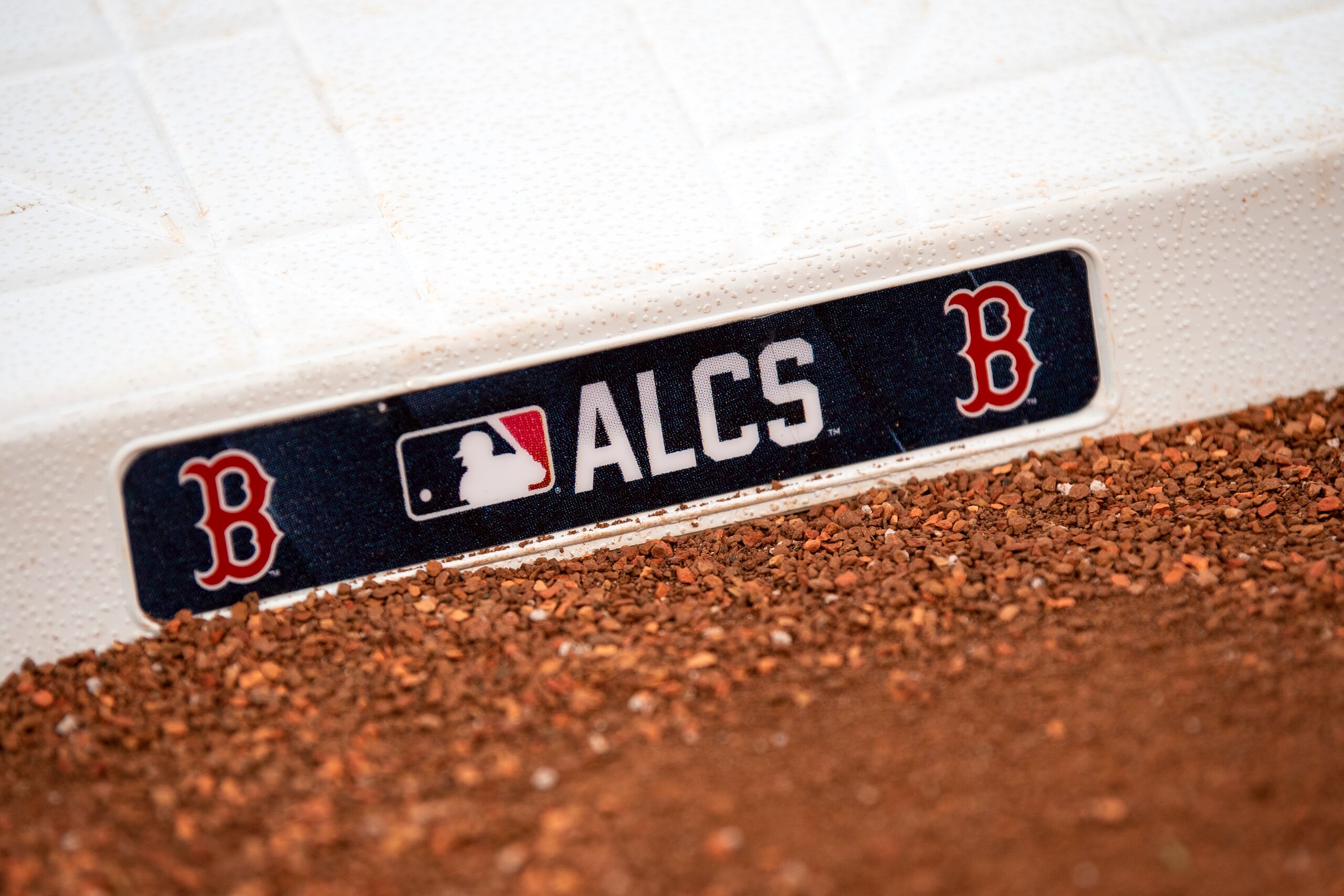 BOSTON, MA - OCTOBER 20: A base is put into place before game five of the 2021 American League Championship Series between the Boston Red Sox and the Houston Astros at Fenway Park on October 20, 2021 in Boston, Massachusetts. (Photo by Billie Weiss/Boston Red Sox/Getty Images) BOSTON, MA - OCTOBER 20: A base is put into place before game five of the 2021 American League Championship Series between the Boston Red Sox and the Houston Astros at Fenway Park on October 20, 2021 in Boston, Massachusetts. (Photo by Billie Weiss/Boston Red Sox/Getty Images)
