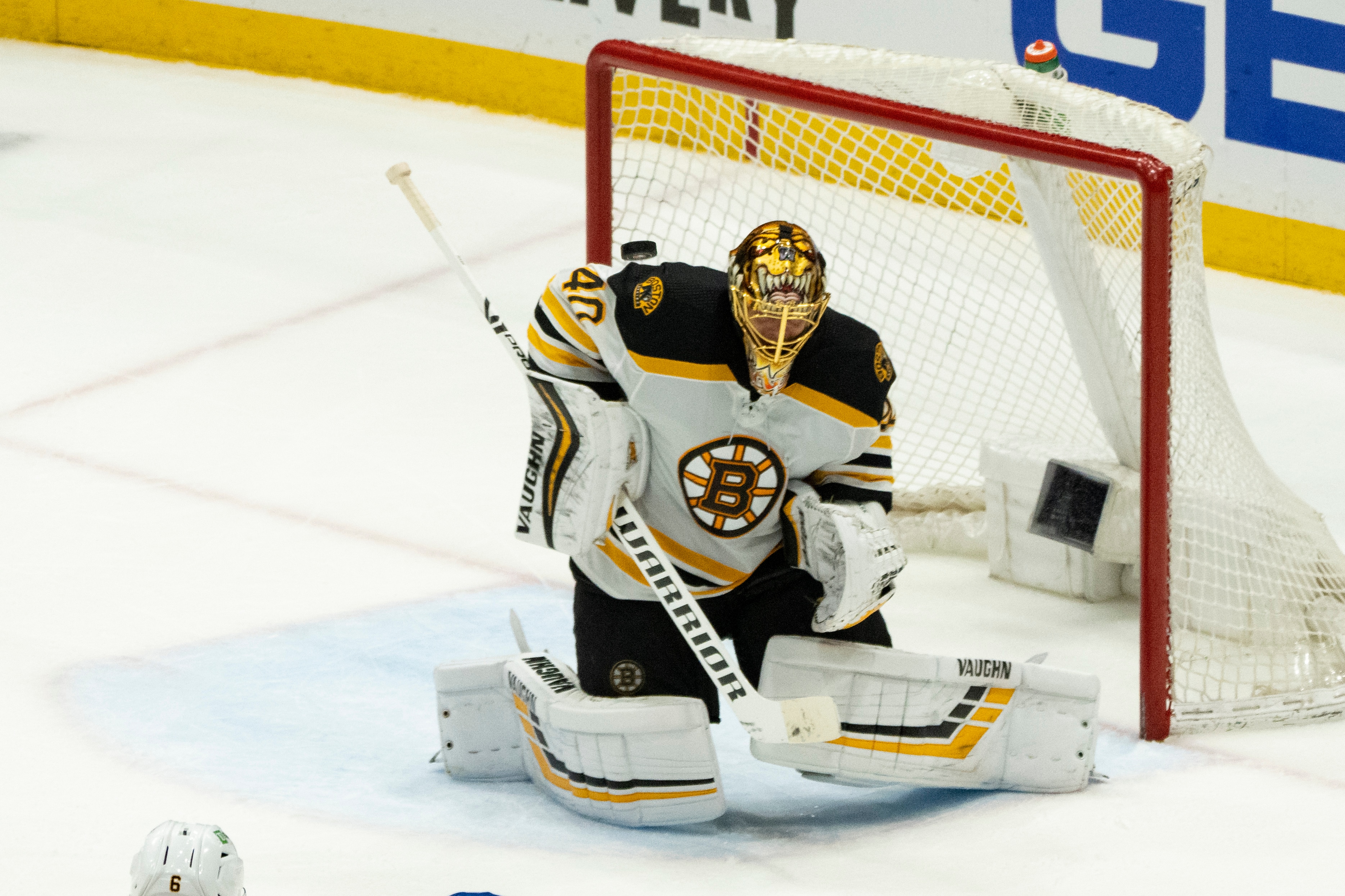 UNIONDALE, NY - JUNE 09: Boston Bruins Goalie Tuukka Rask (40) deflects the puck making a save during the third period of Game 6 of the NHL Stanley Cup Playoffs Second Round between the Boston Bruins and the New York Islanders on June 9, 2021, at the Nassau Veterans Memorial Coliseum in Uniondale, NY. (Photo by Gregory Fisher/Icon Sportswire via Getty Images)