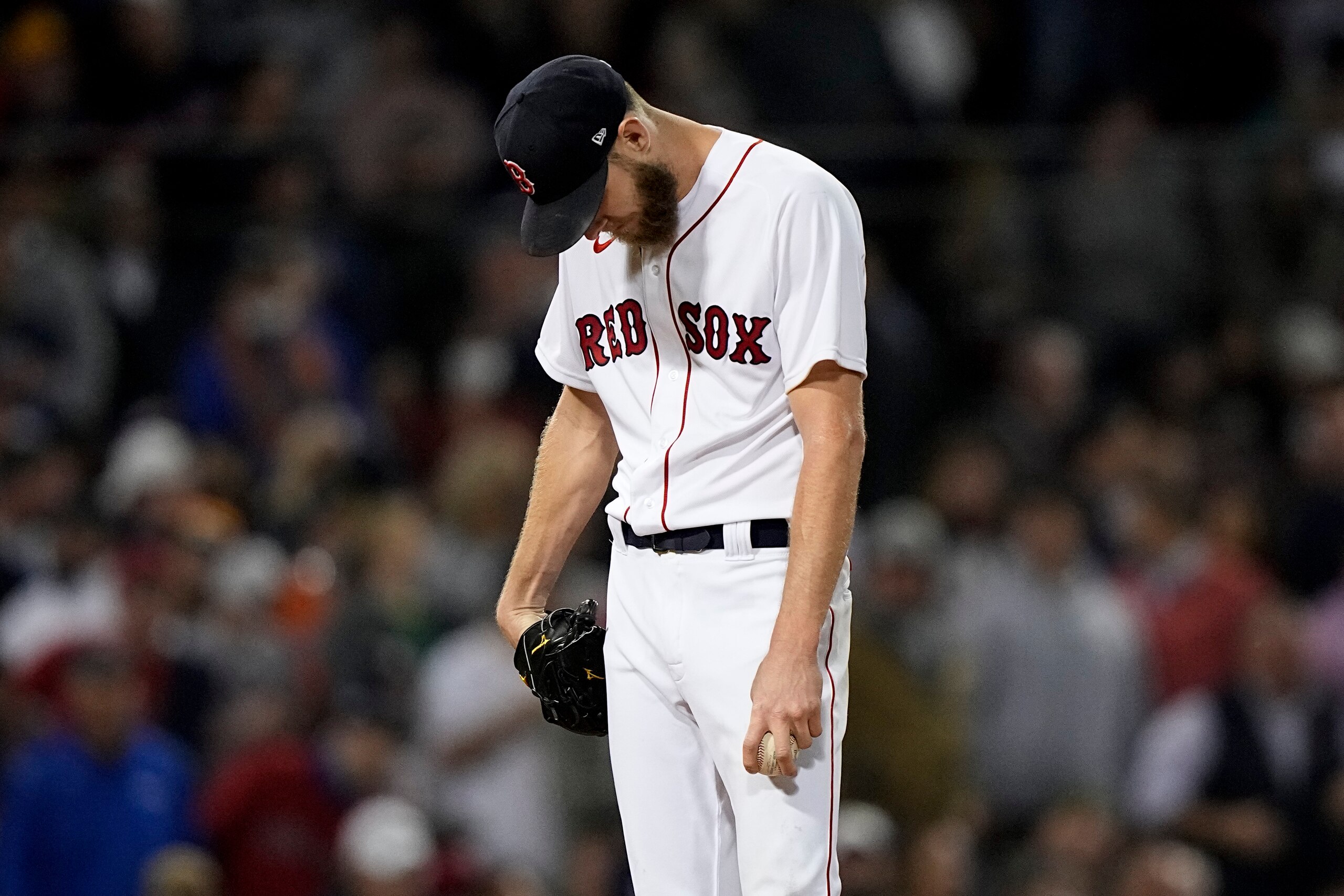 Boston Red Sox starting pitcher Chris Sale reacts after giving up a two run double to Houston Astros' Yordan Alvarez during the sixth inning in Game 5 of baseball's American League Championship Series Wednesday, Oct. 20, 2021, in Boston. (AP Photo/David J. Phillip) Boston Red Sox starting pitcher Chris Sale reacts after giving up a two run double to Houston Astros' Yordan Alvarez during the sixth inning in Game 5 of baseball's American League Championship Series Wednesday, Oct. 20, 2021, in Boston. (AP Photo/David J. Phillip)