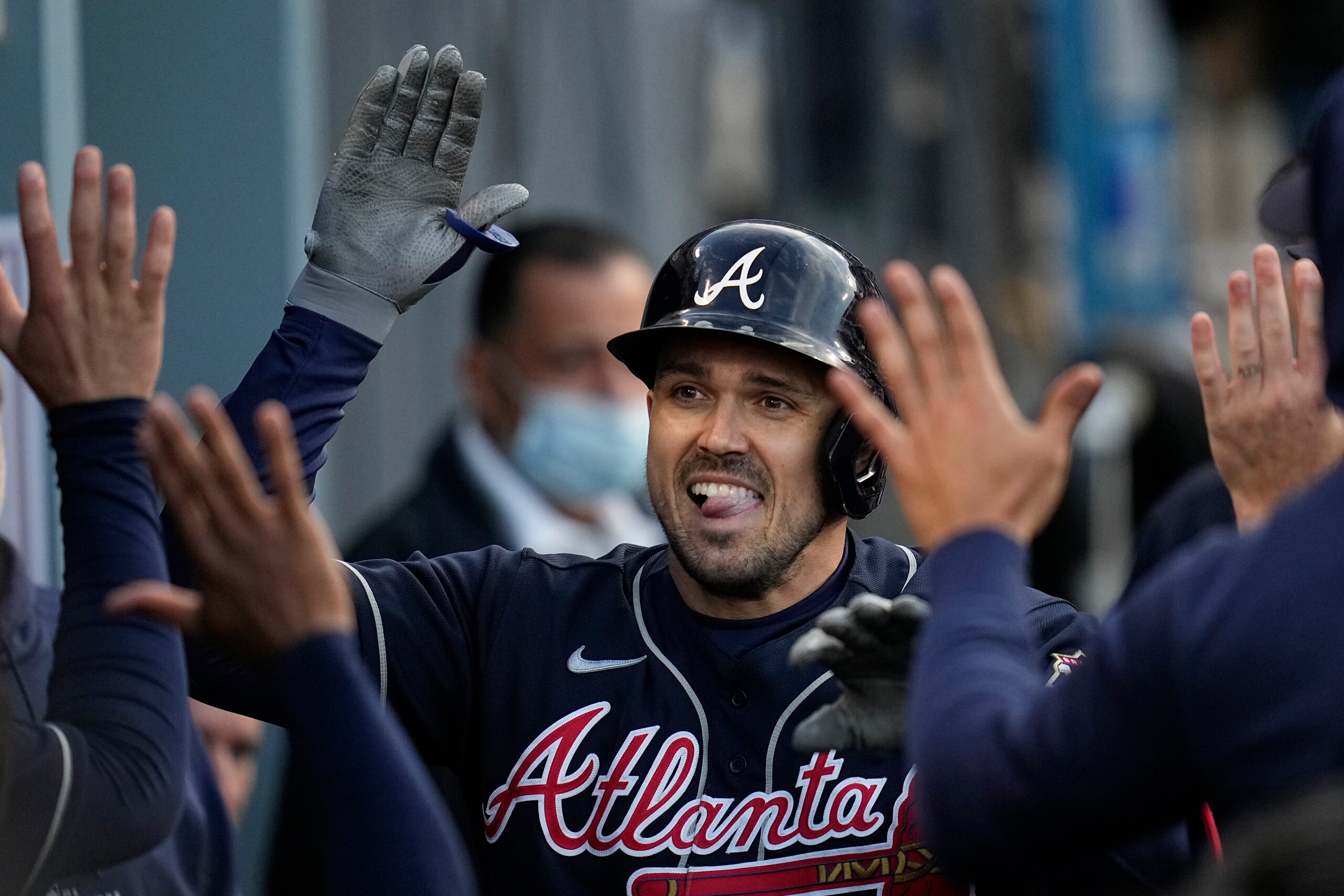 Atlanta Braves' Adam Duvall celebrates his solo home run in the second inning against the Los Angeles Dodgers in Game 4 of baseball's National League Championship Series Wednesday, Oct. 20, 2021, in Los Angeles. (AP Photo/Ashley Landis)