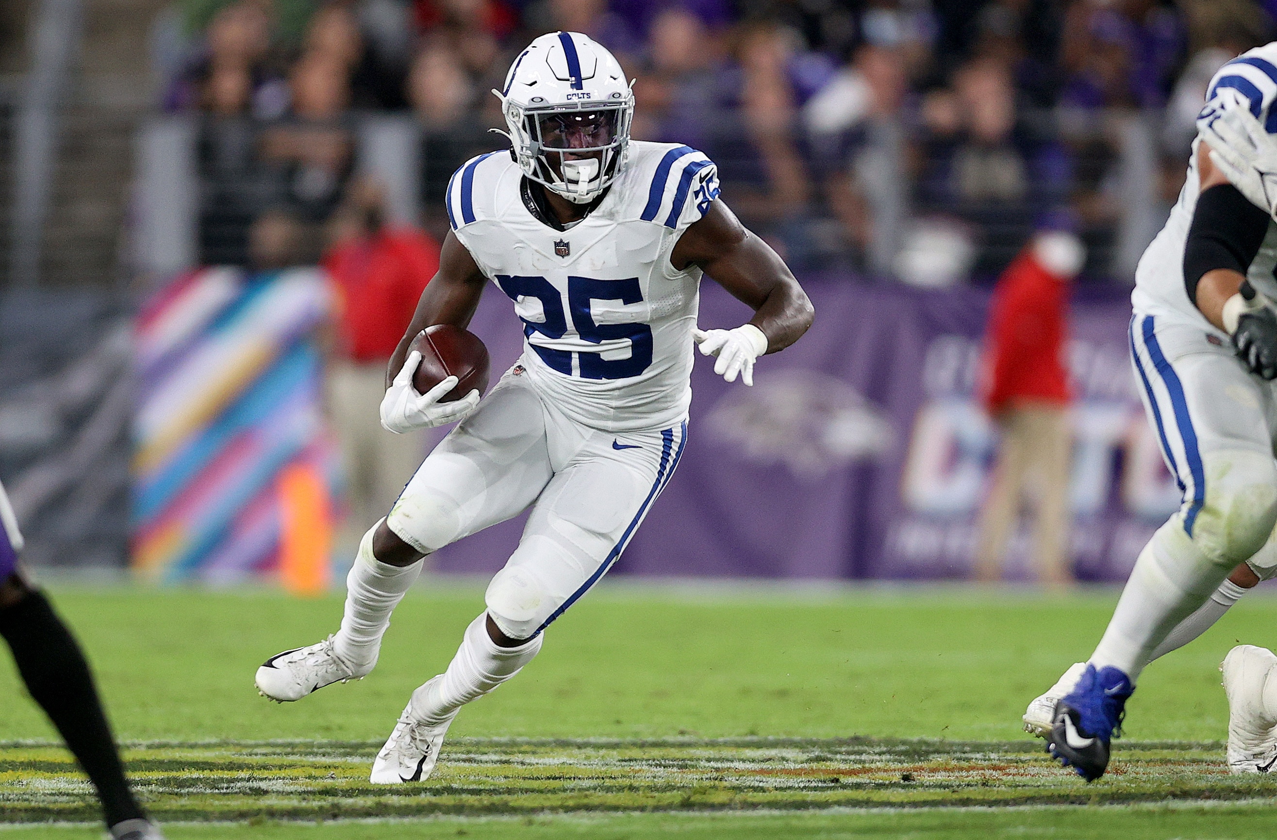 BALTIMORE, MARYLAND - OCTOBER 11: Marlon Mack #25 of the Indianapolis Colts rushes during the second quarter in a game against the Baltimore Ravens at M&T Bank Stadium on October 11, 2021 in Baltimore, Maryland. (Photo by Rob Carr/Getty Images)